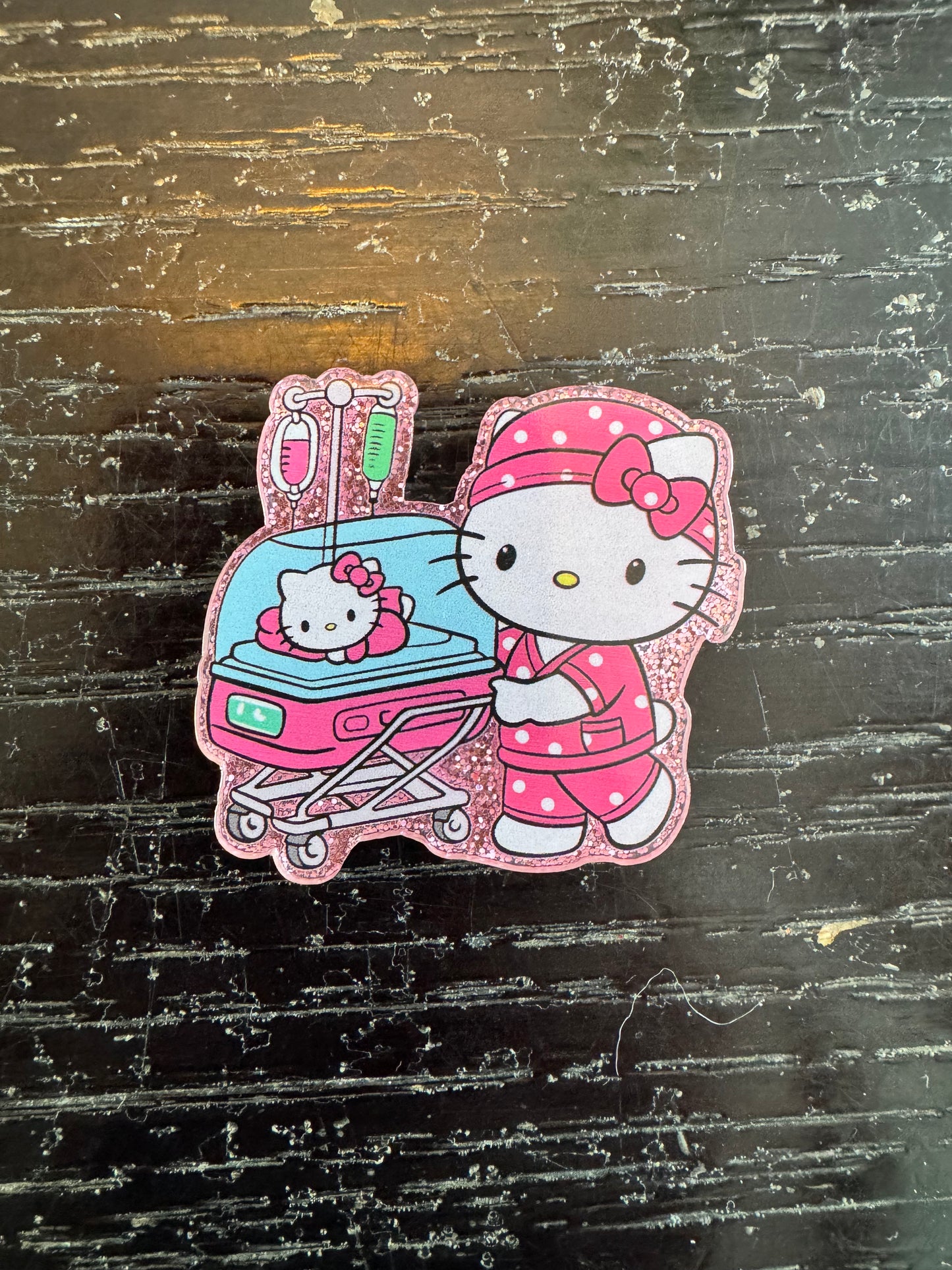 Hello Kitty nurse badge reel