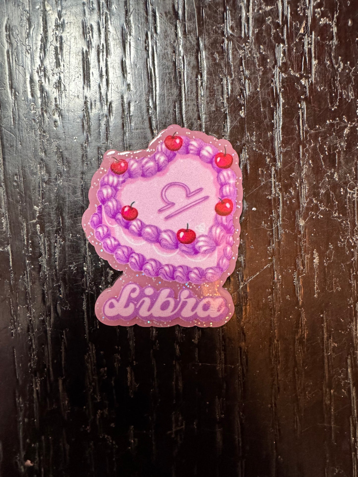 Libra badge reel