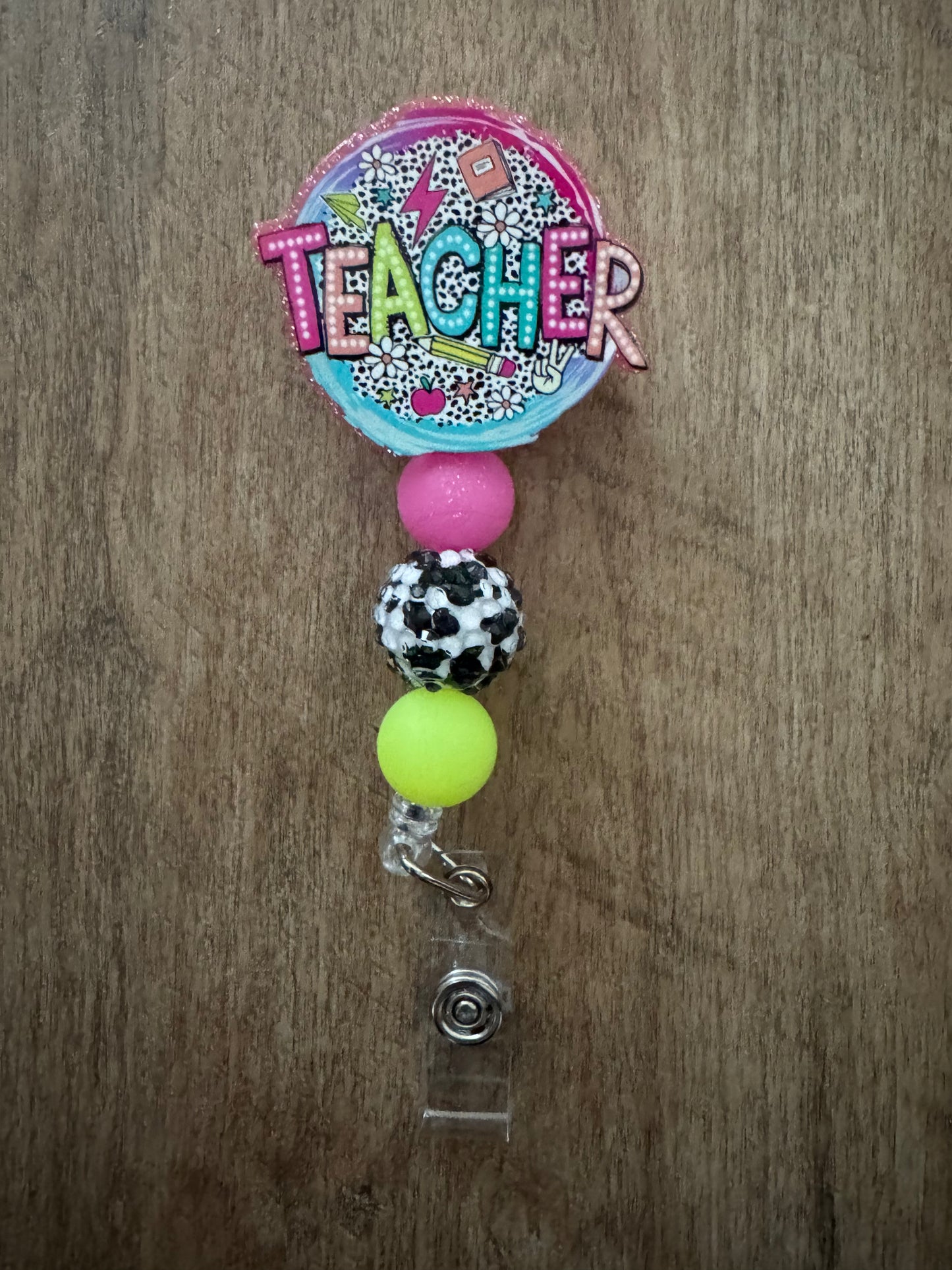 Teacher badge reel