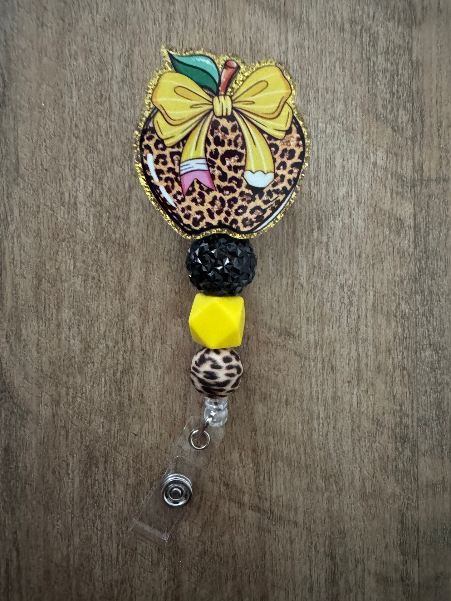Teacher badge reel
