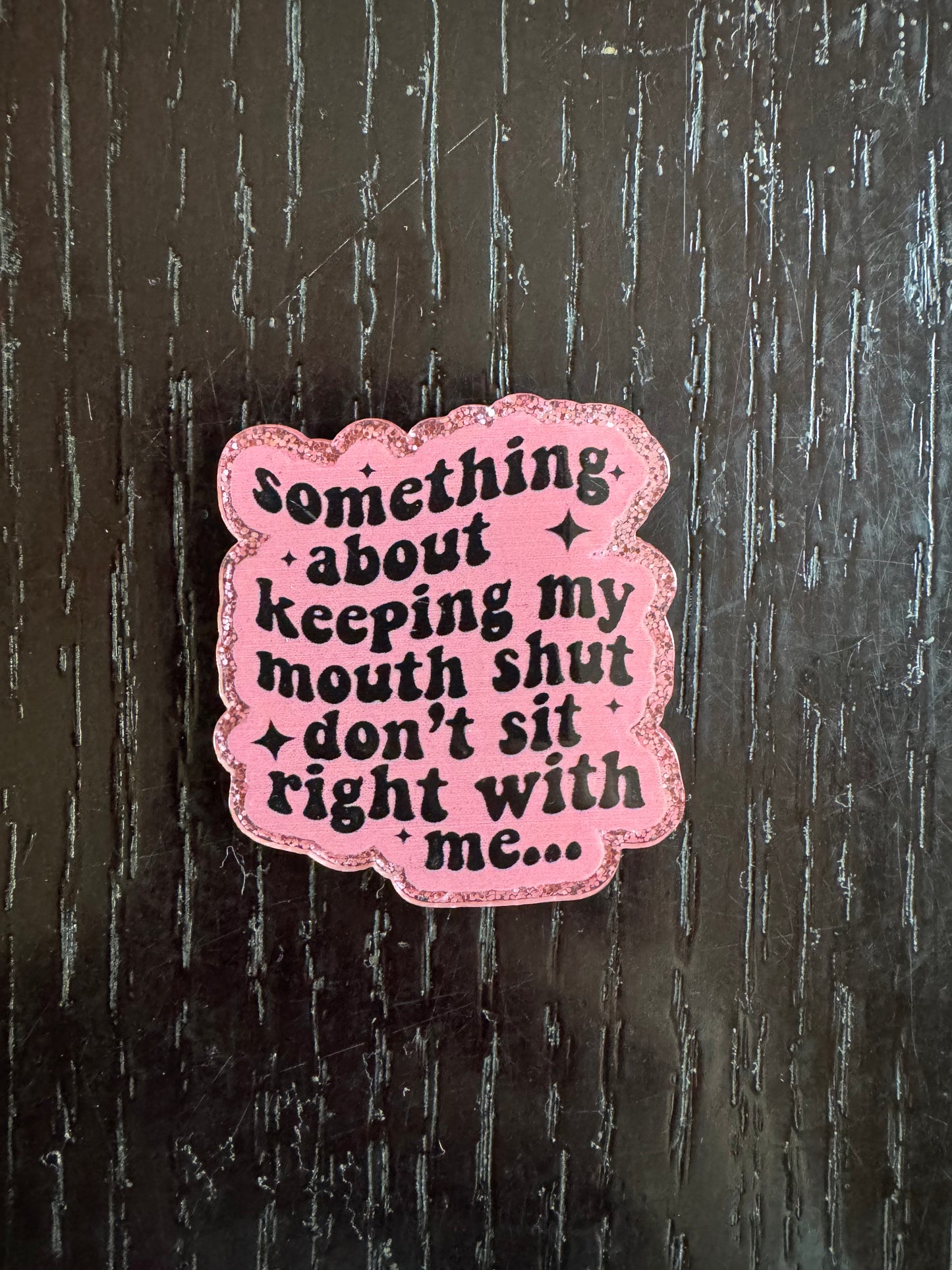 Something about keeping my mouth shut badge reel