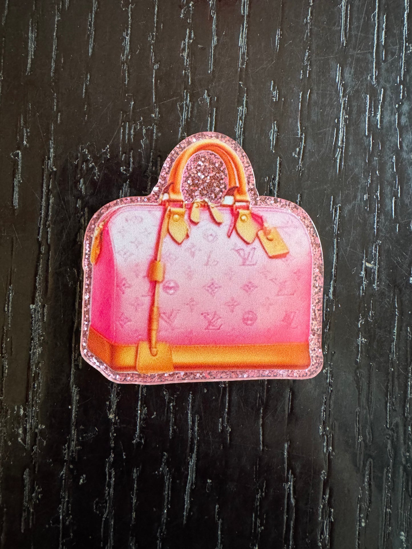 LV bag badge reel