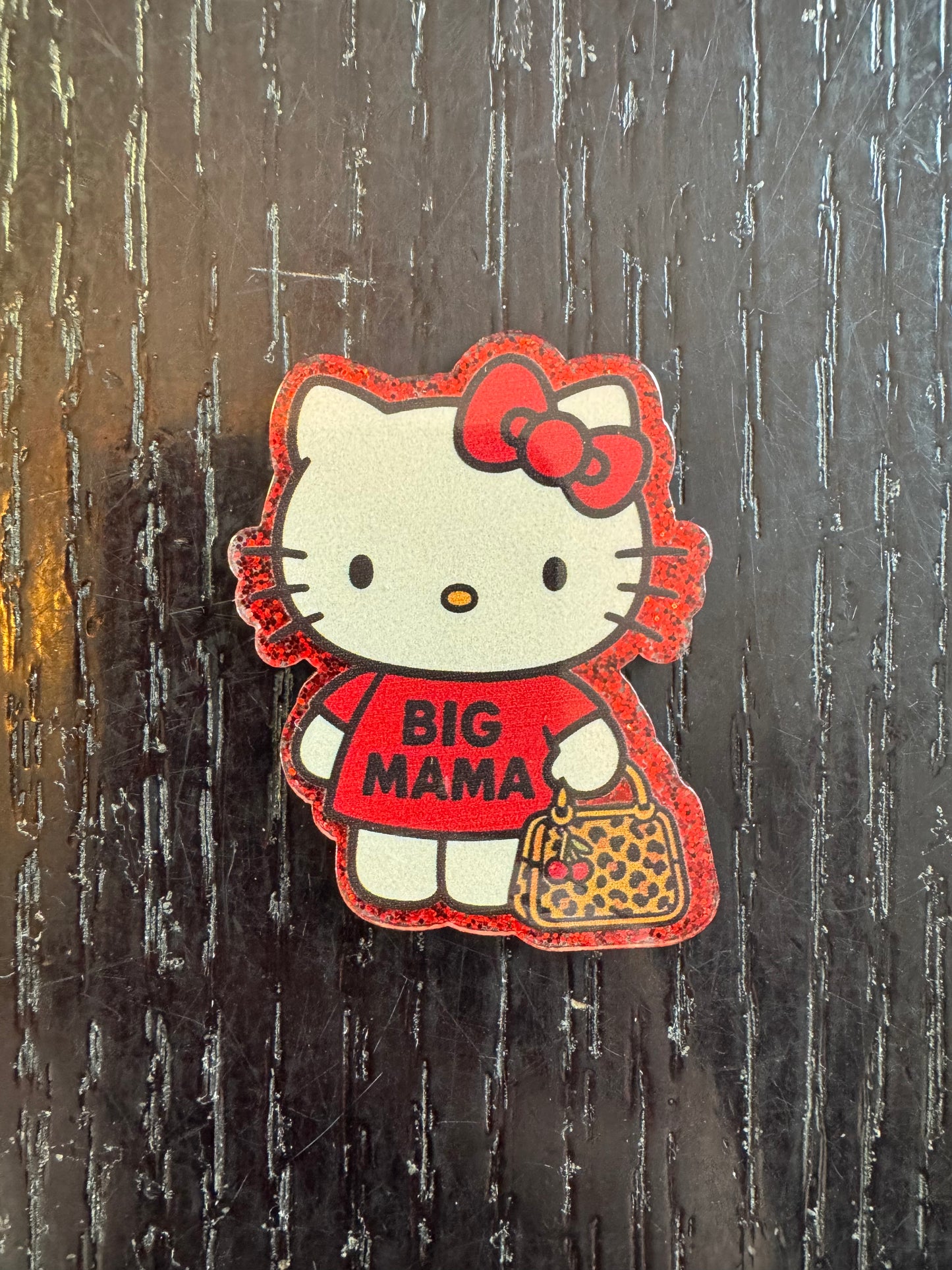 Hello kitty badge reel