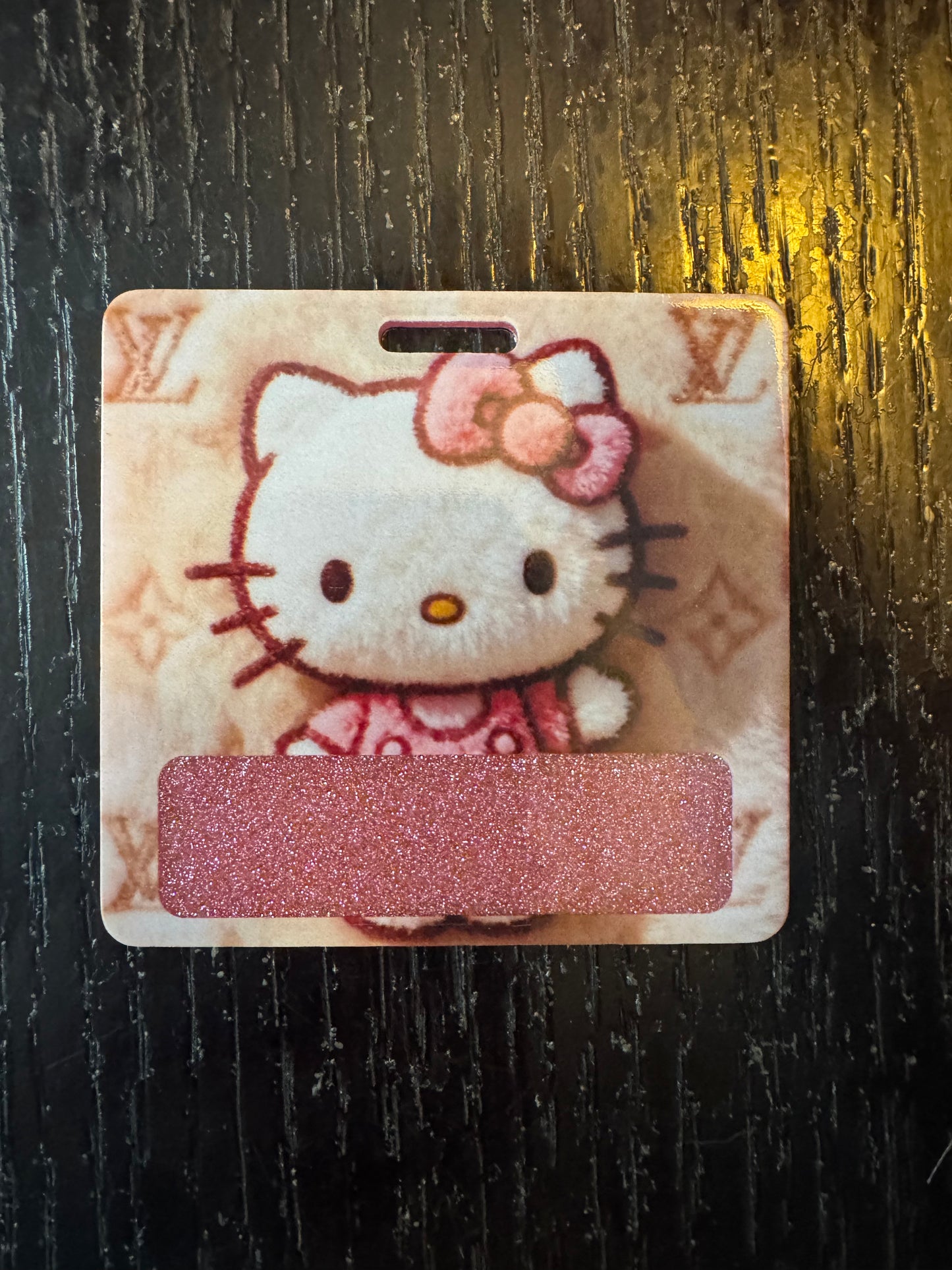 Hello kitty badge buddy