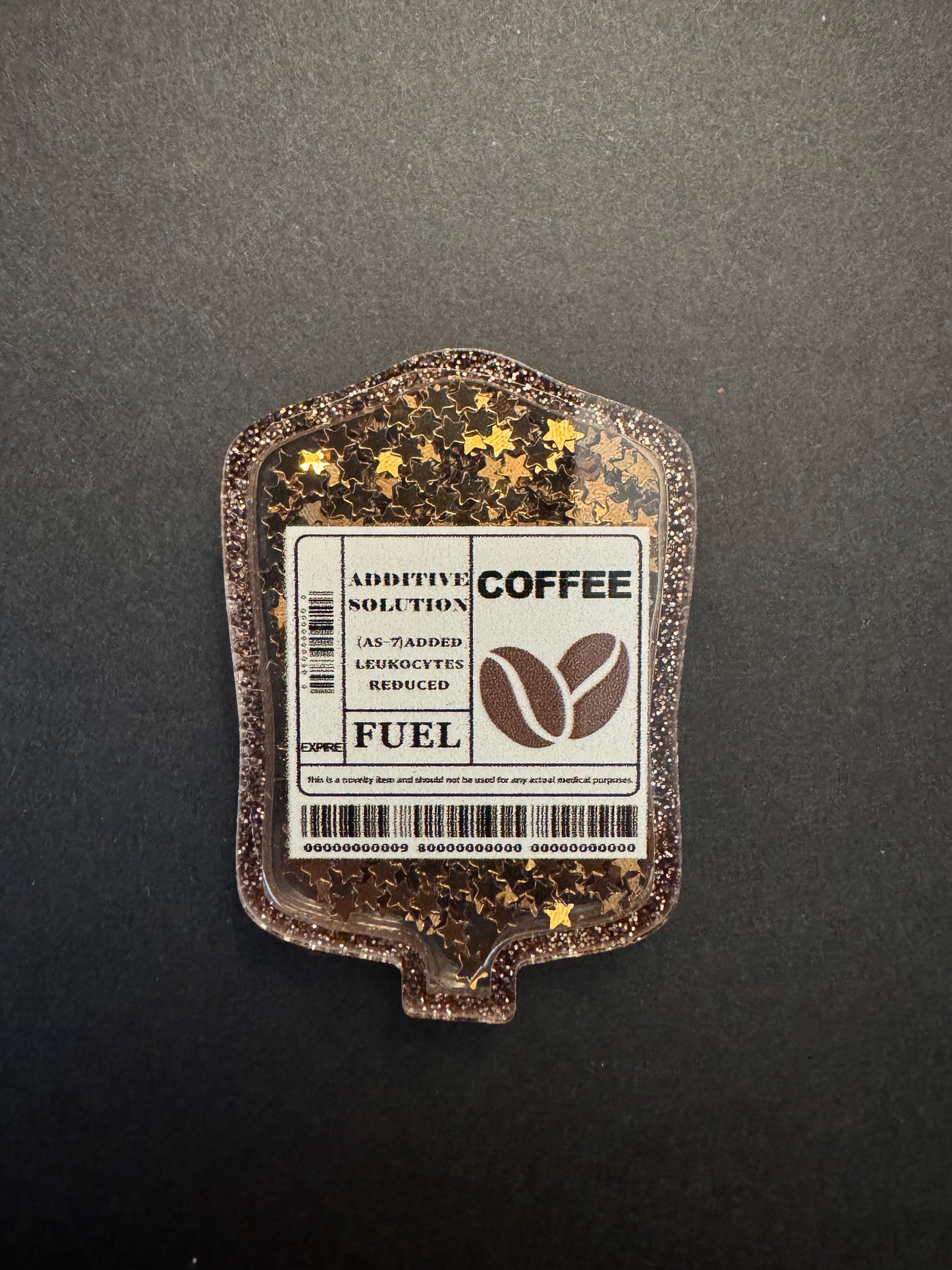 Coffee shaker badge reel