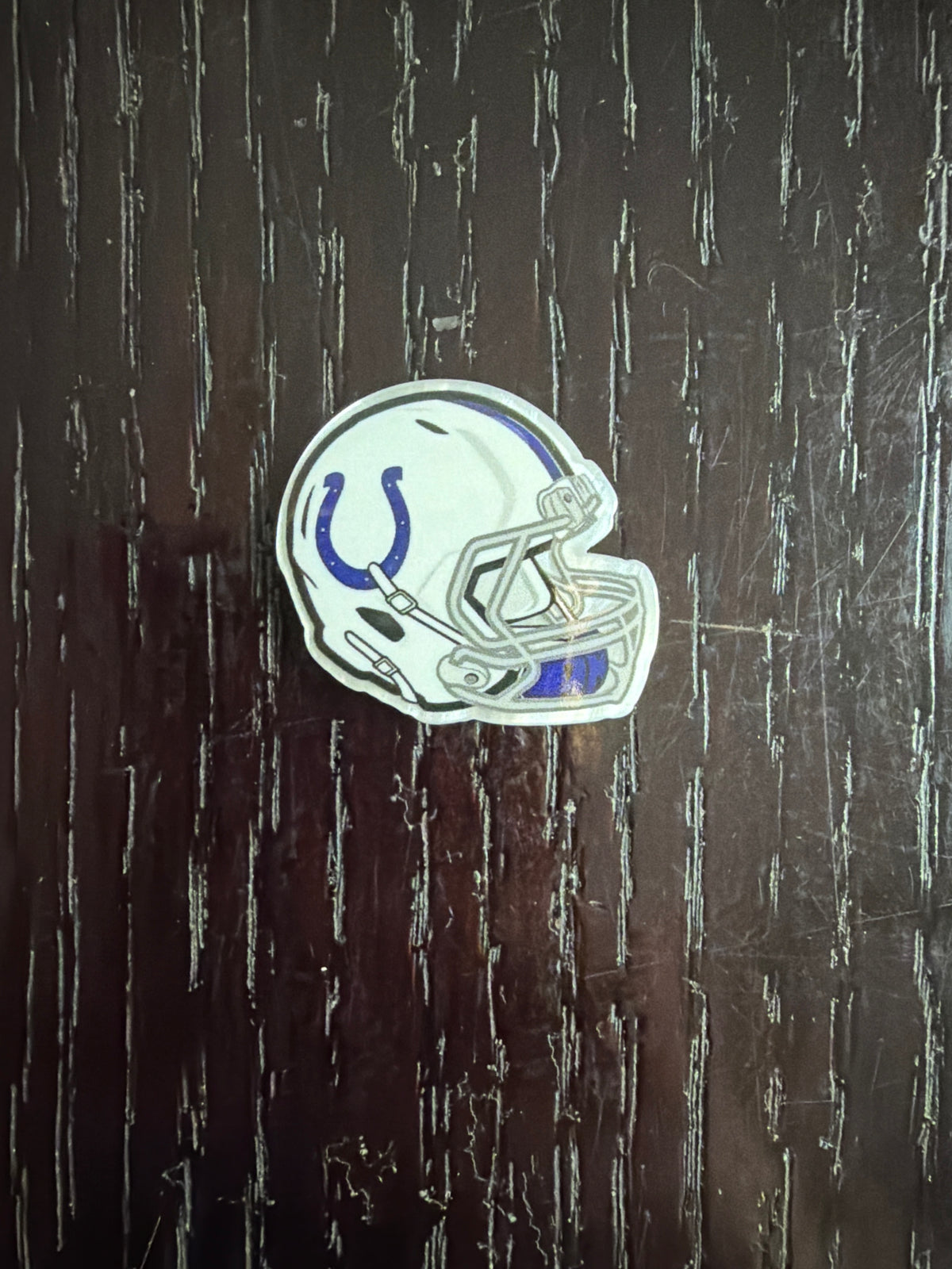2. ADD A FOOTBALL HELMET CHARM