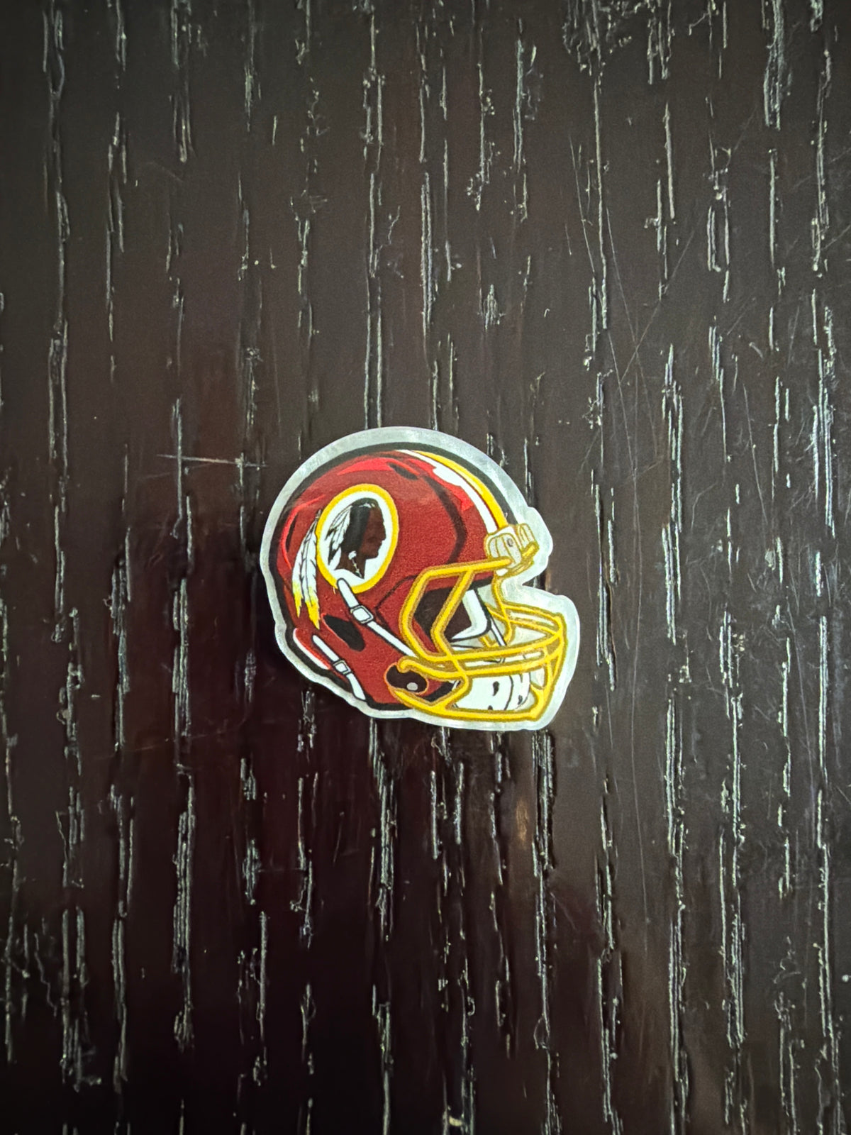 2. ADD A FOOTBALL HELMET CHARM