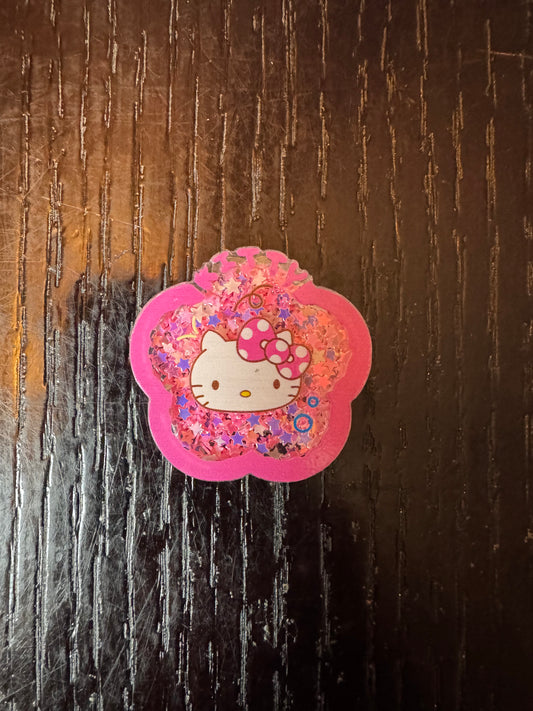 Hello Kitty shaker badge reel
