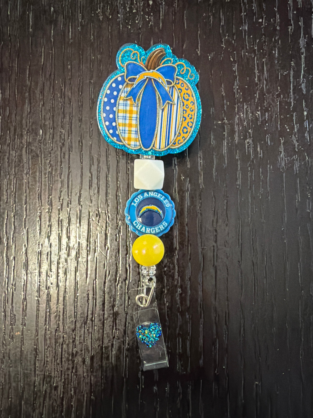 Chargers badge reel