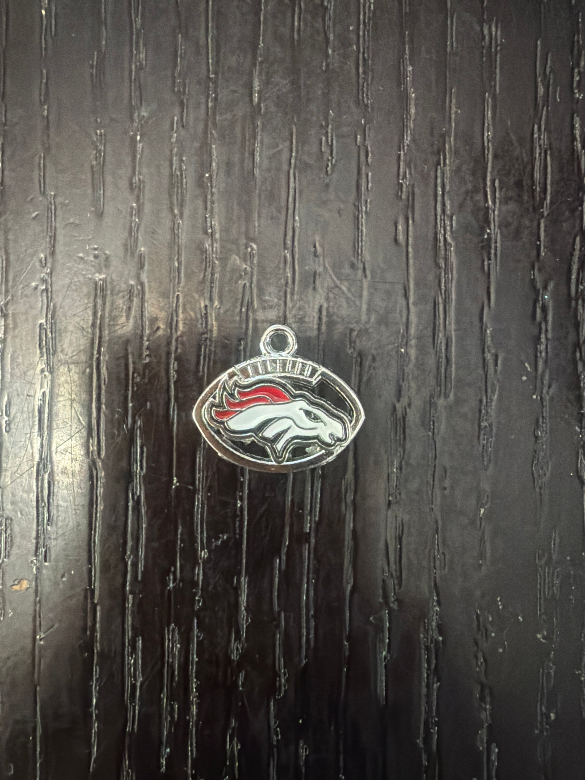 1. ADD A FOOTBALL CHARM