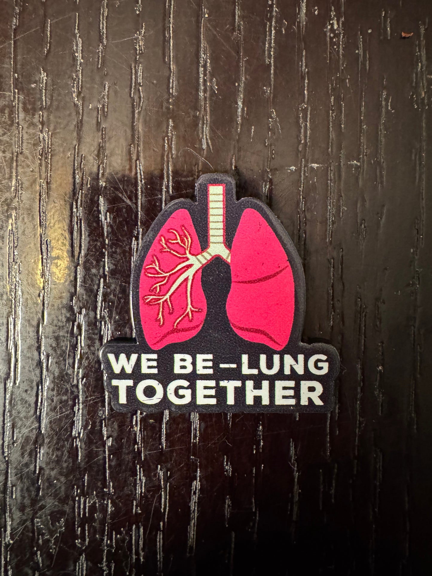 We be-lung together badge reel