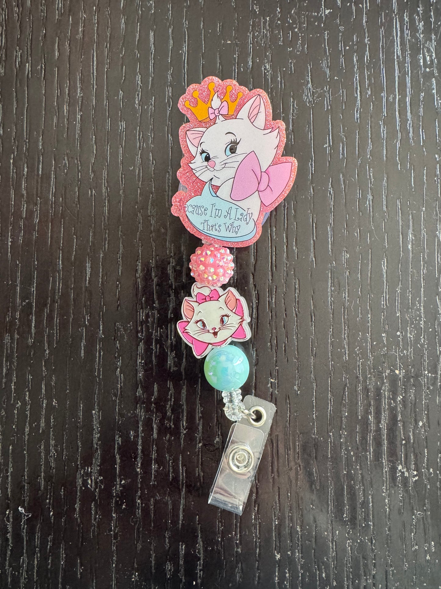 Marie cat badge reel
