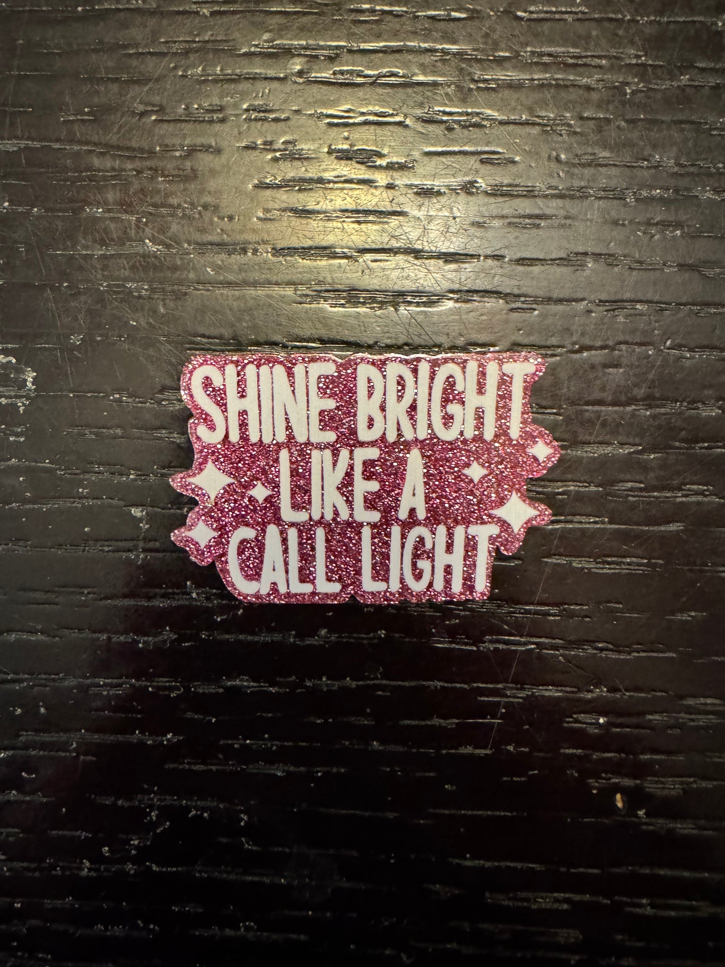Shine bright like a call light badge reel