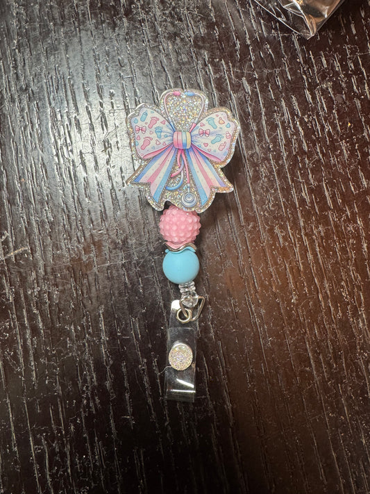 Baby feet badge reel