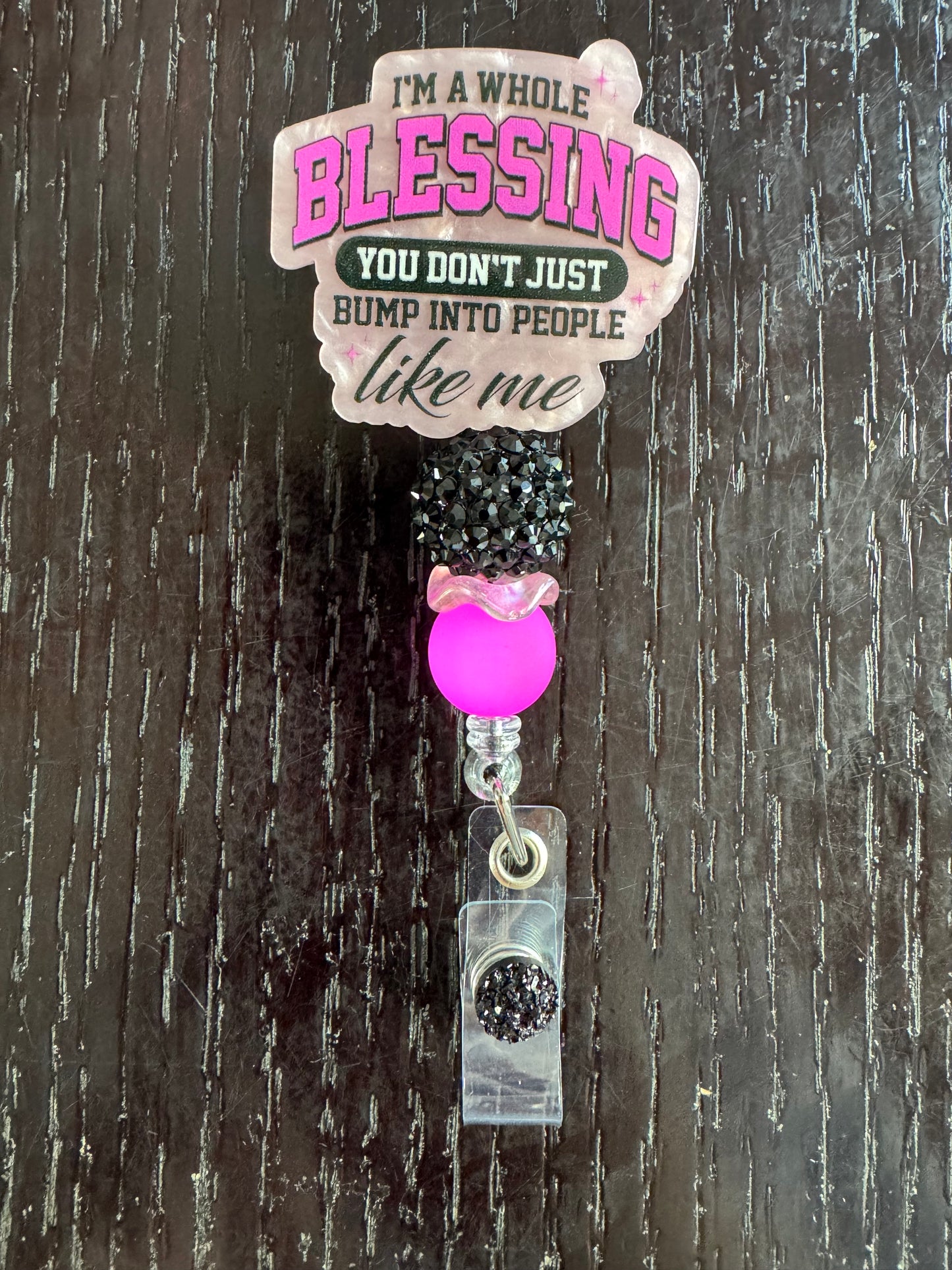 Blessing badge reel