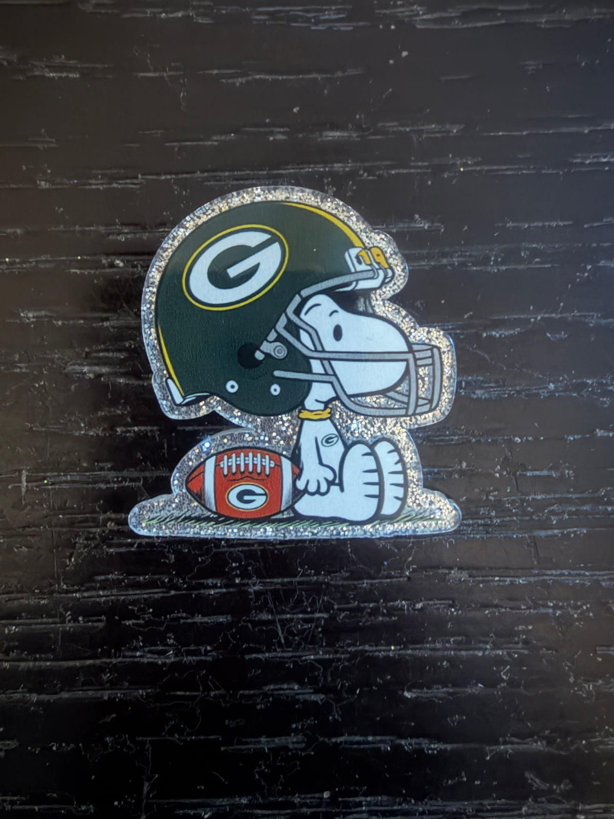 Packers badge reel