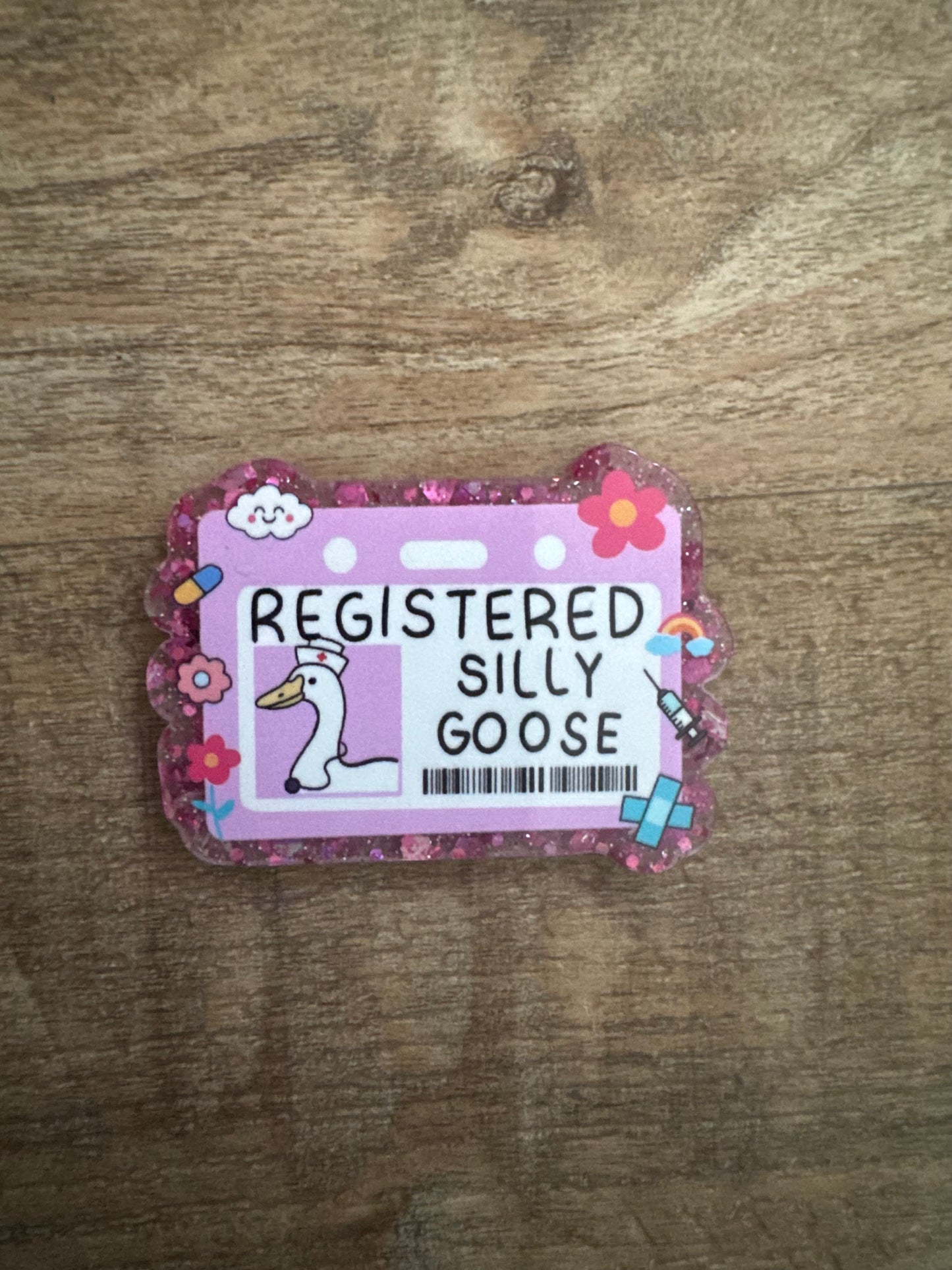 Registered silly goose badge reel