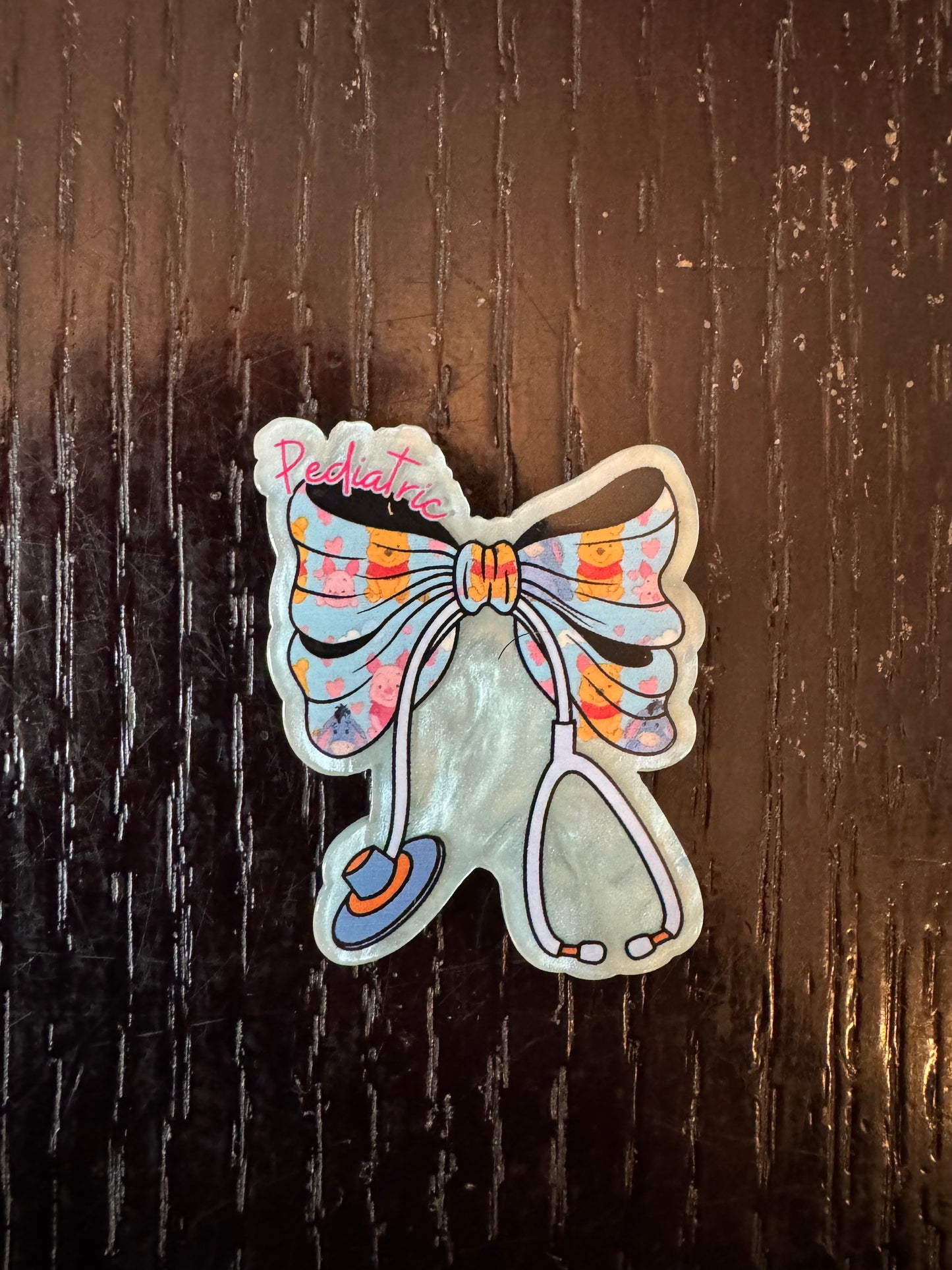 Pediatric nurse bow badge reel