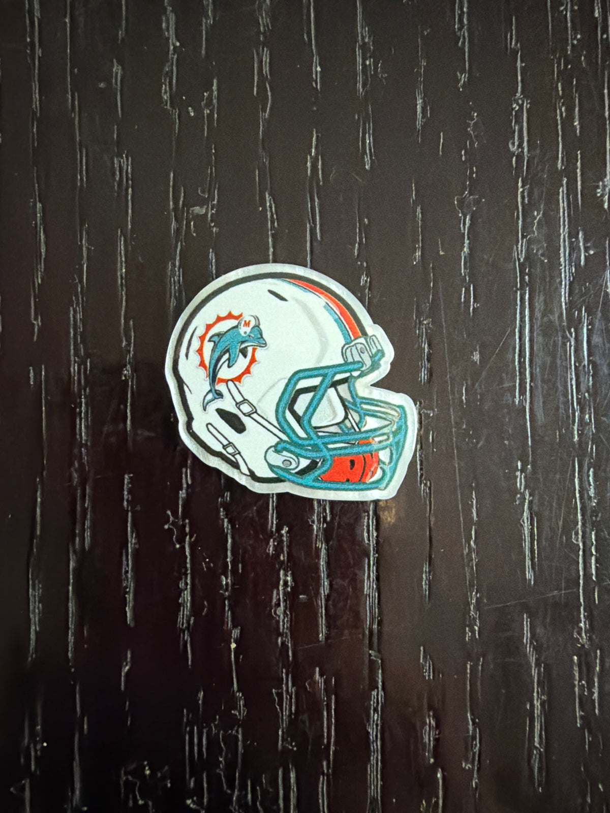 2. ADD A FOOTBALL HELMET CHARM