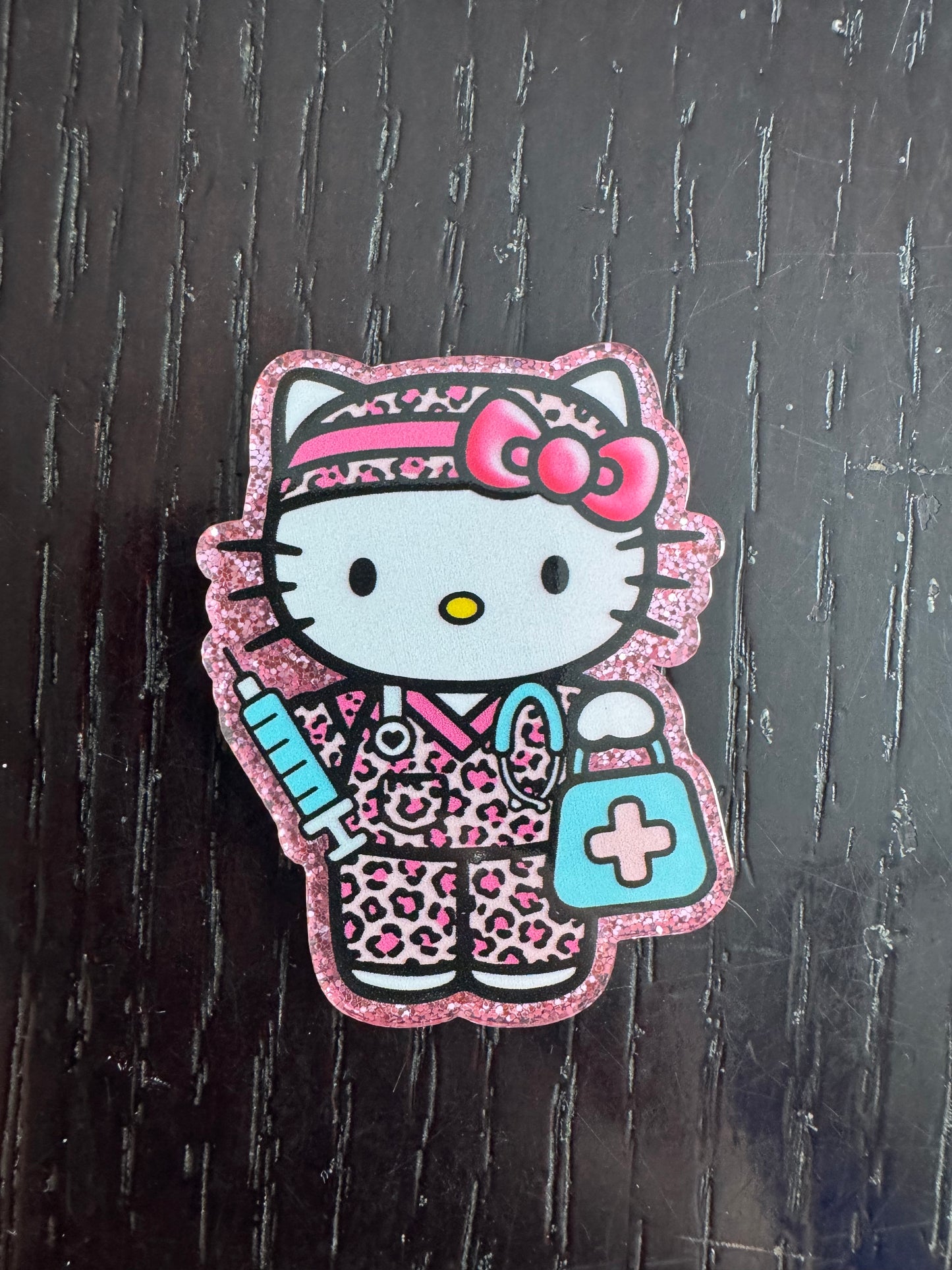 Hello Kitty nurse badge reel