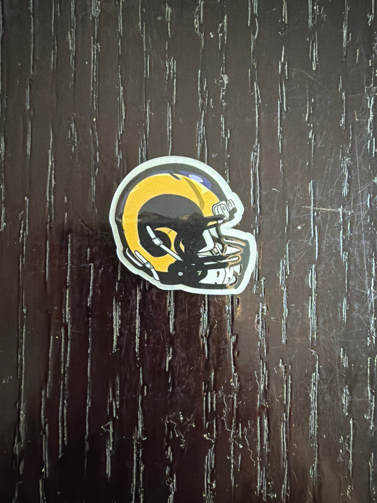 2. ADD A FOOTBALL HELMET CHARM