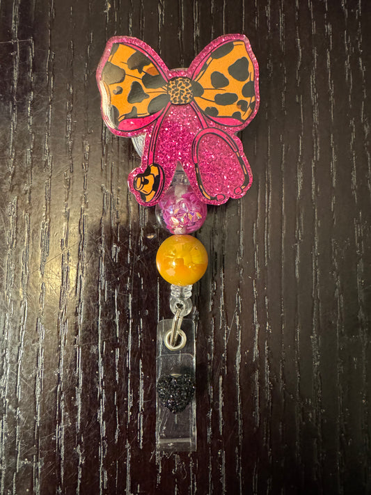 Medical bow badge reel