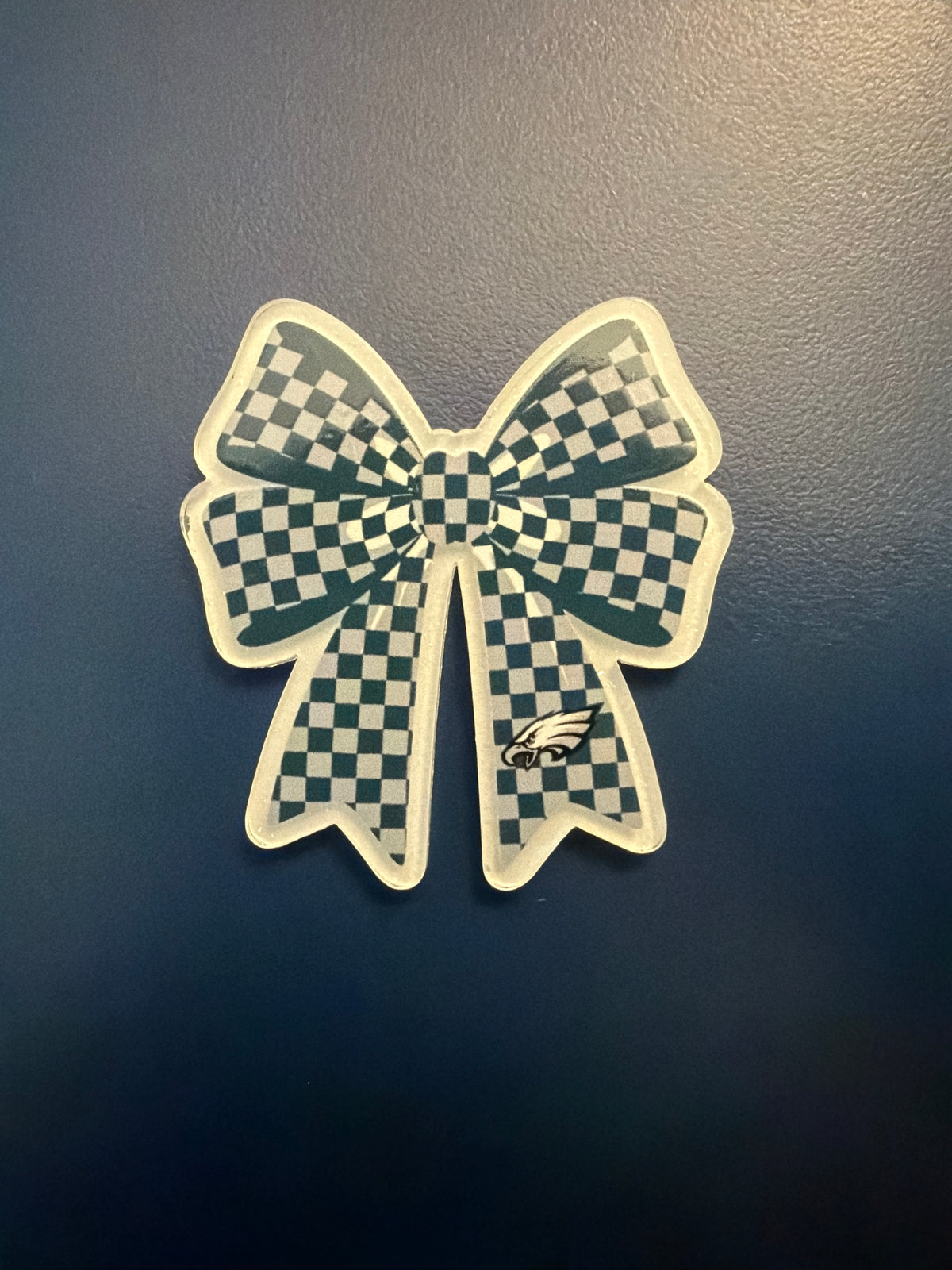 3. ADD A BOW FOOTBALL CHARM