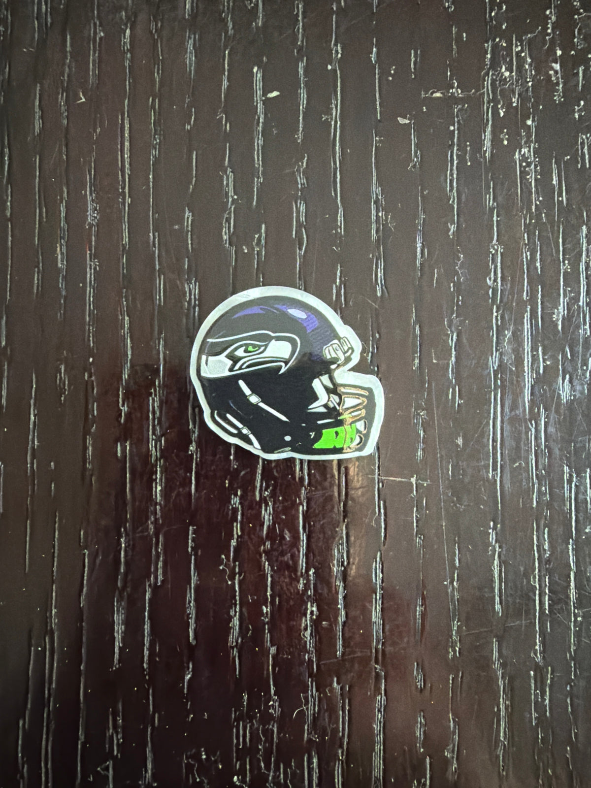 2. ADD A FOOTBALL HELMET CHARM
