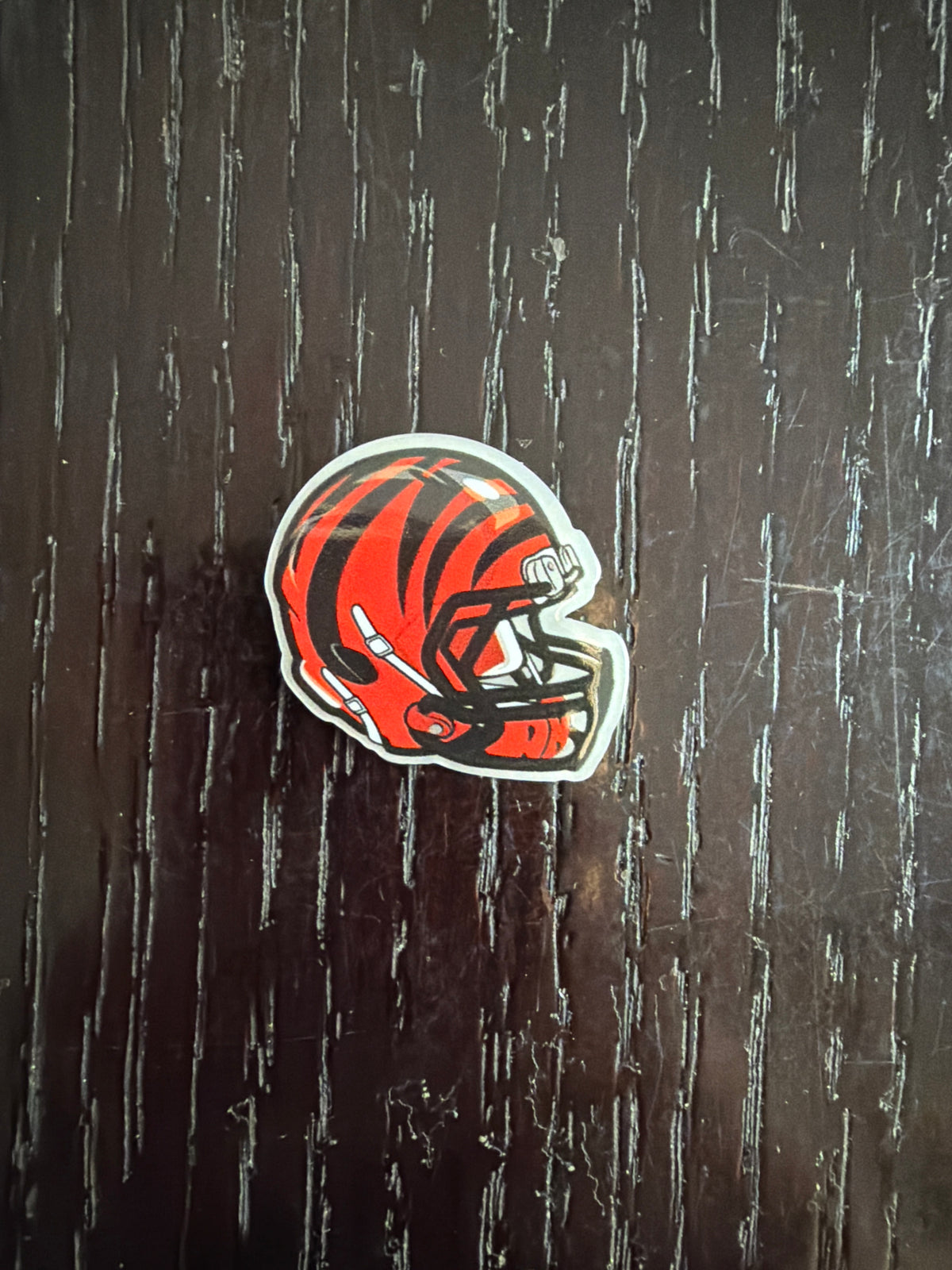 2. ADD A FOOTBALL HELMET CHARM