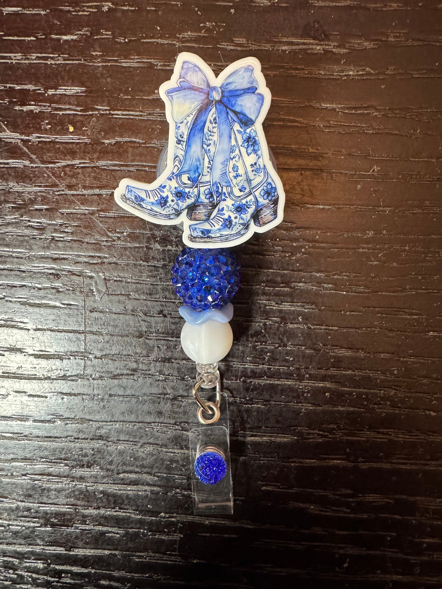 Blue boots badge reel
