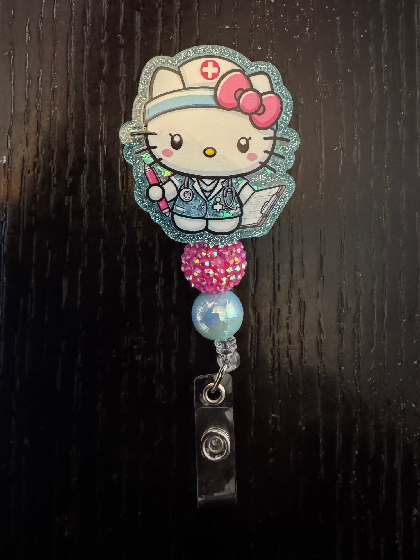 Hello Kitty Nurse shaker badge reel