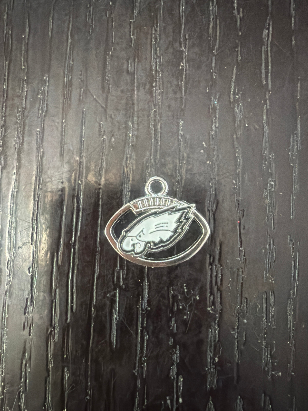 1. ADD A FOOTBALL CHARM