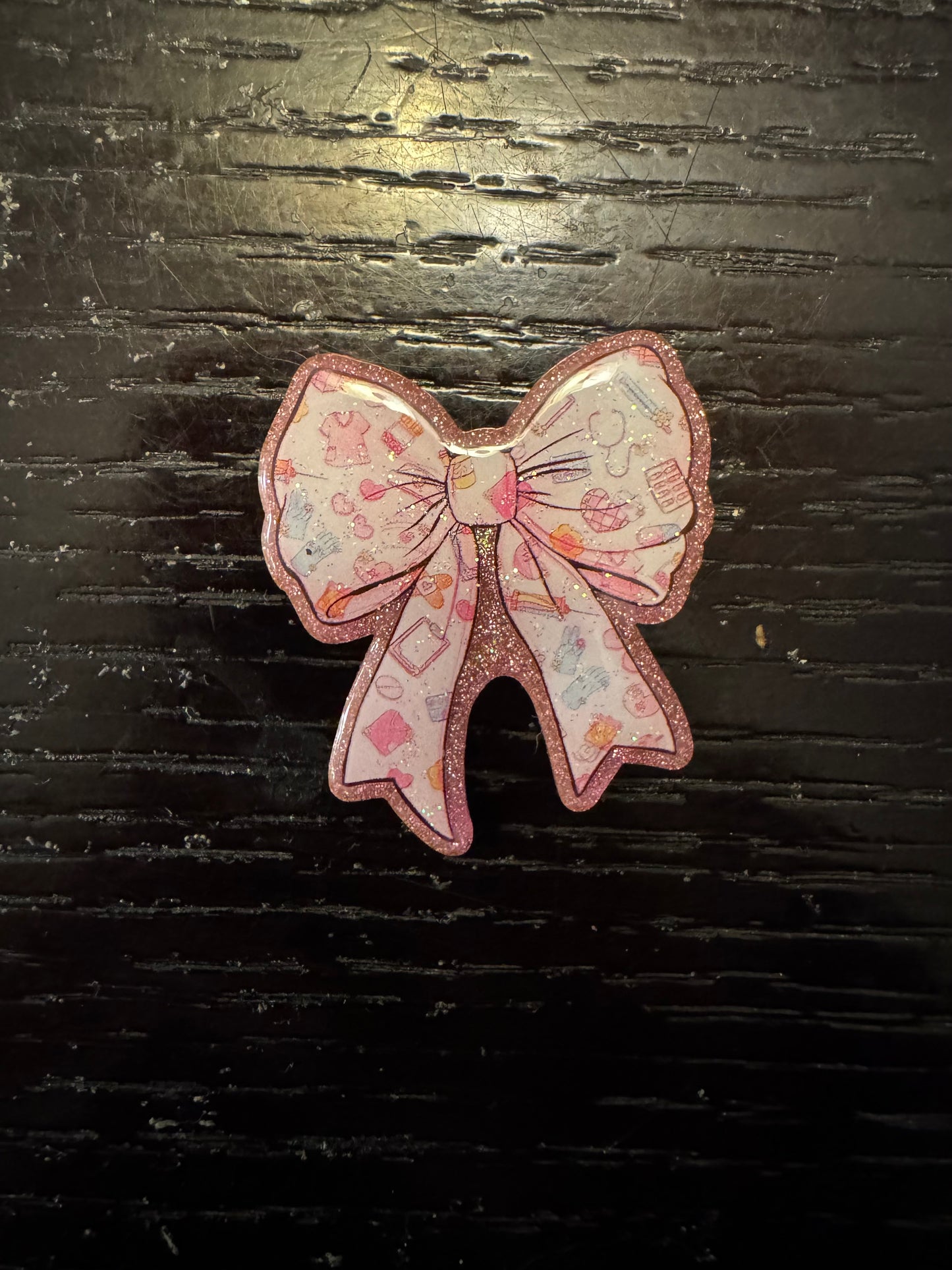 Medical bow badge reel