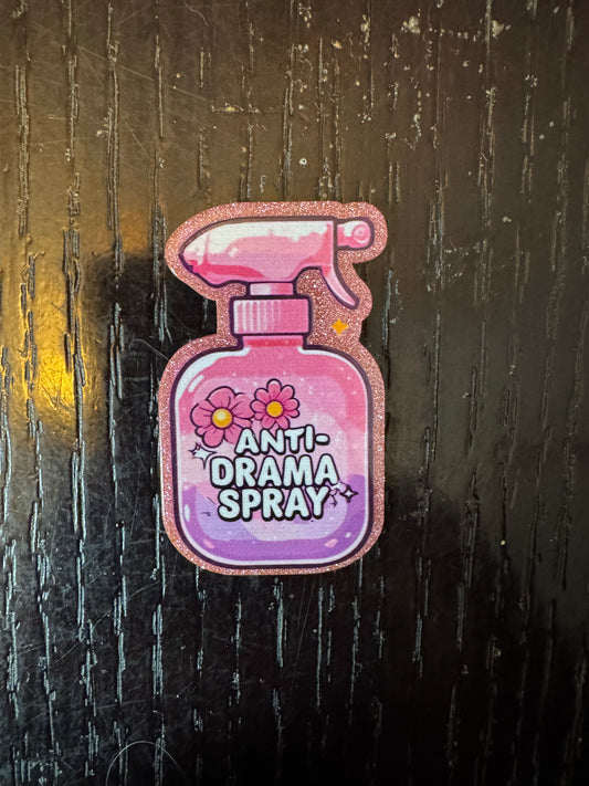 Anti drama spray badge reel