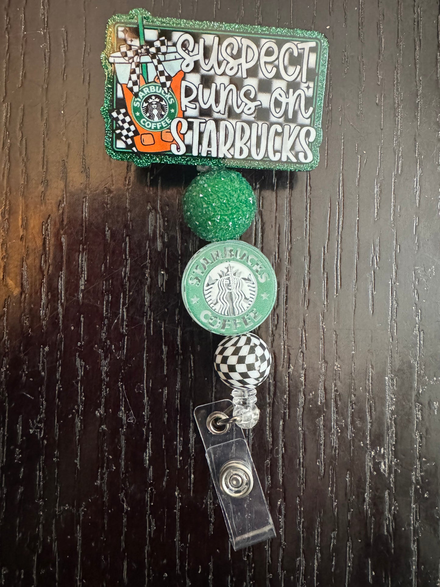 Suspect runs on Starbucks badge reel