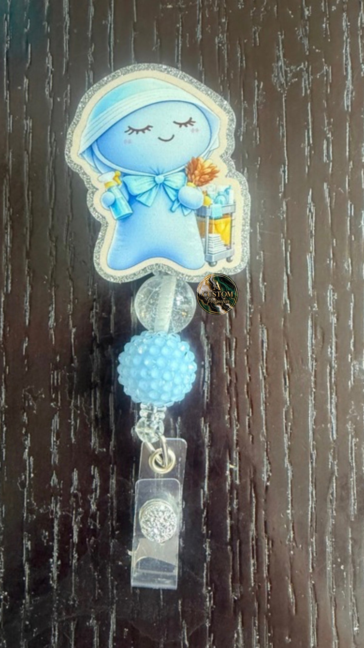 Glove baby environmental service badge reel