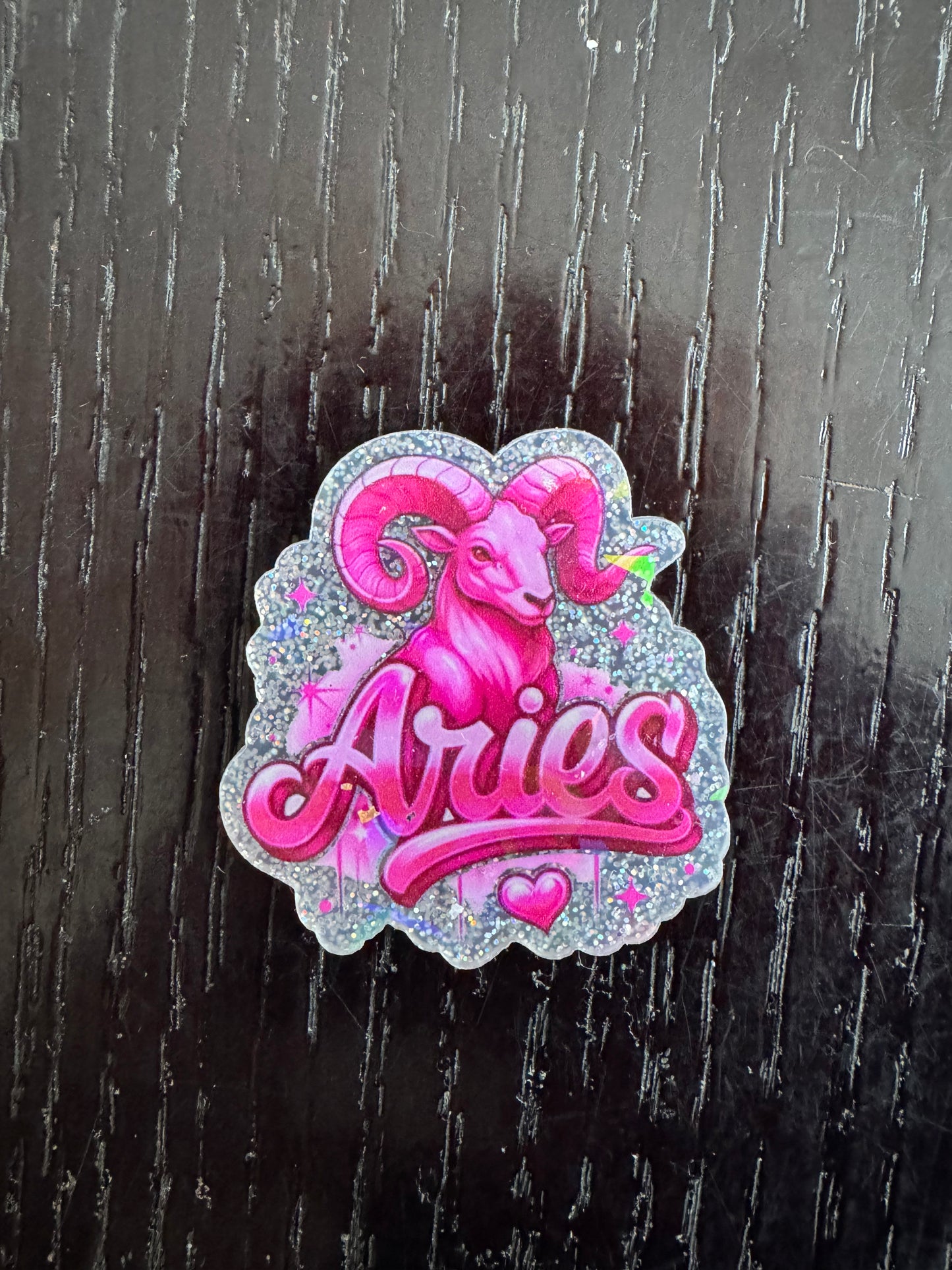 Aries badge reel