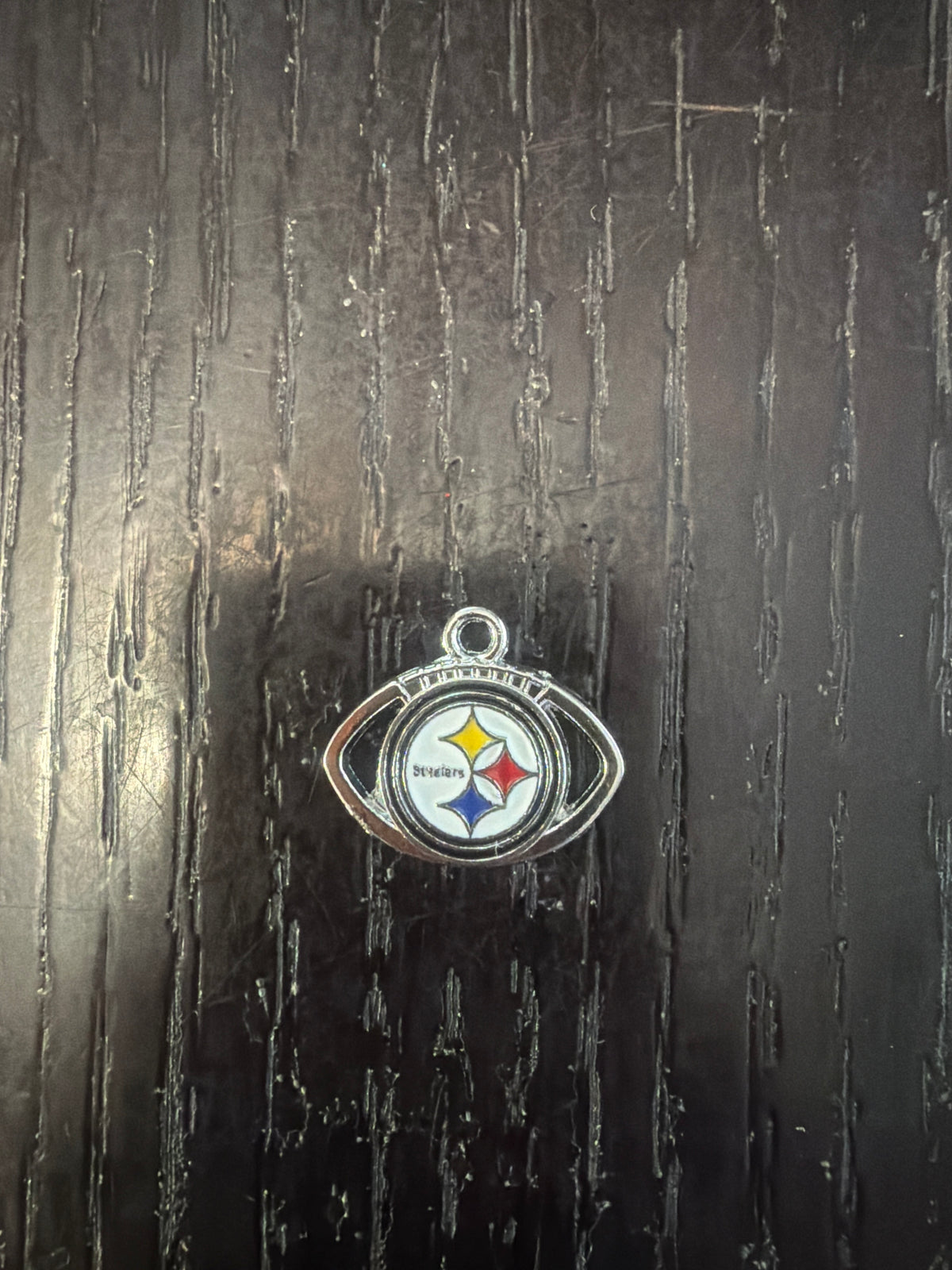 1. ADD A FOOTBALL CHARM