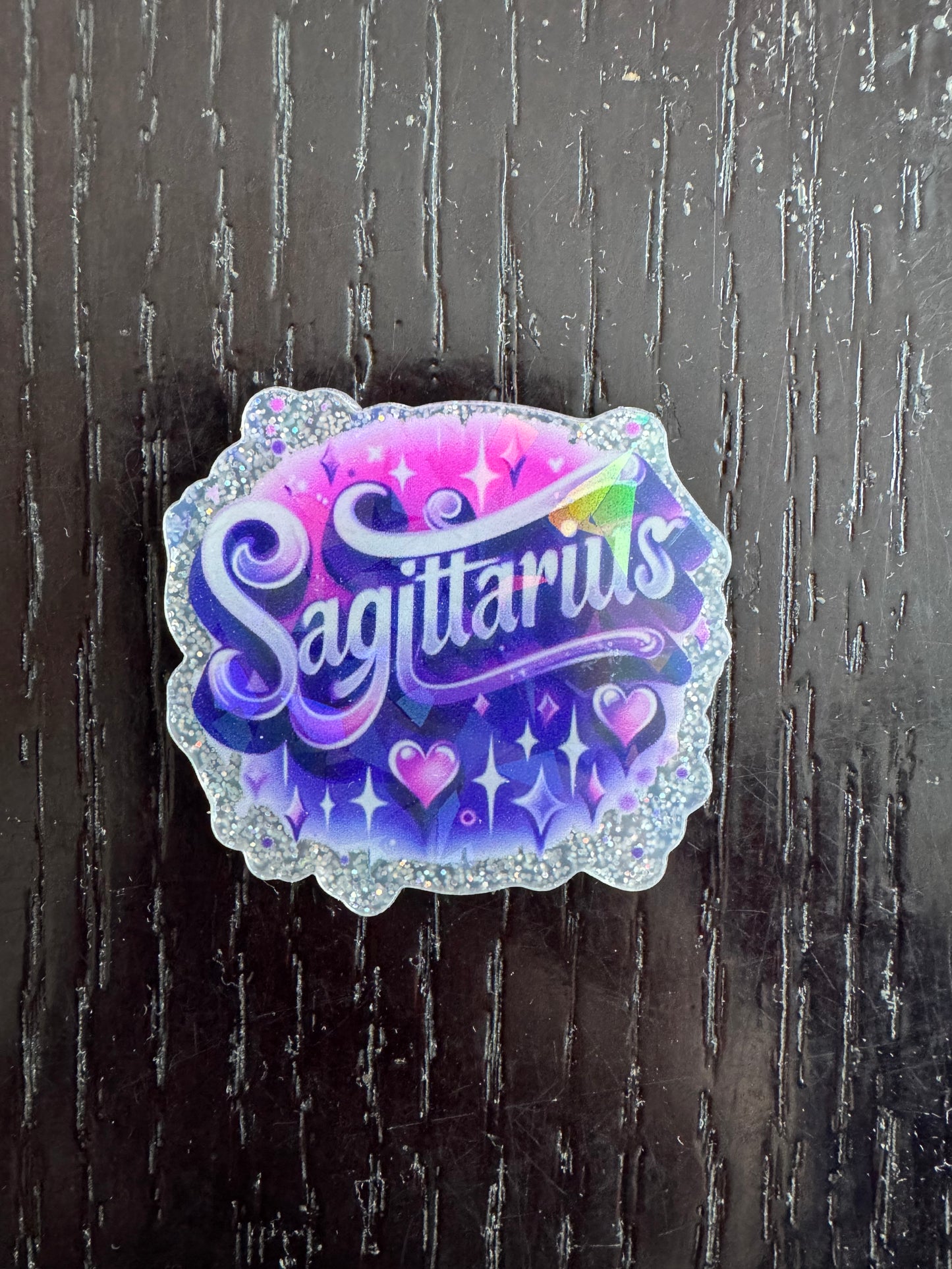 Sagittarius badge reel