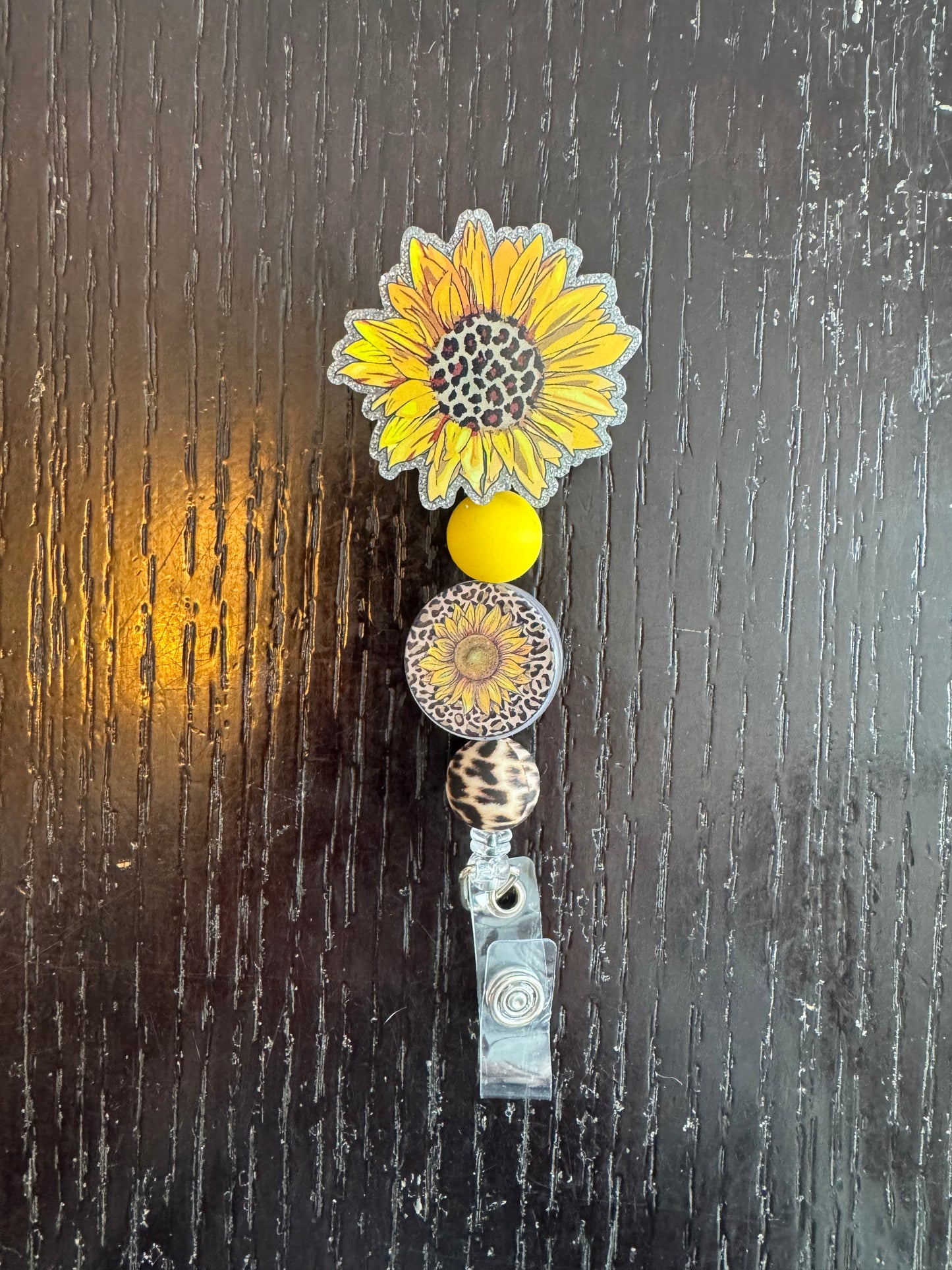 Sunflower badge reel