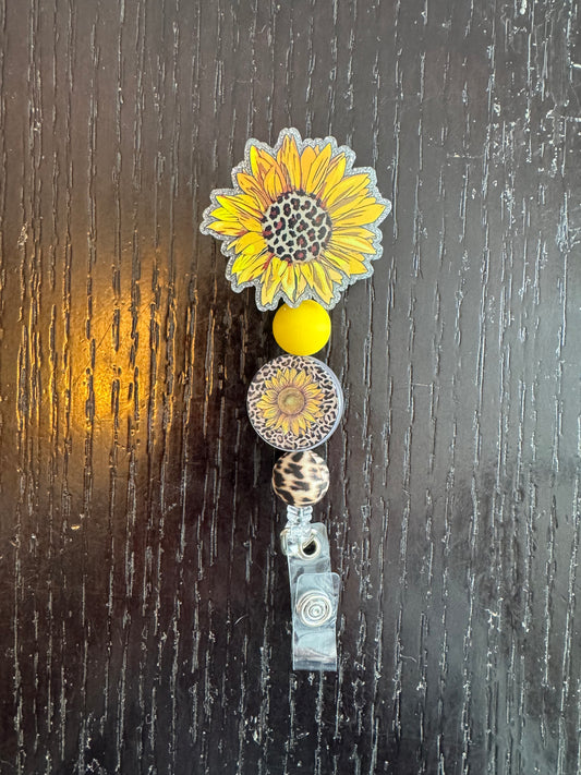 Sunflower badge reel