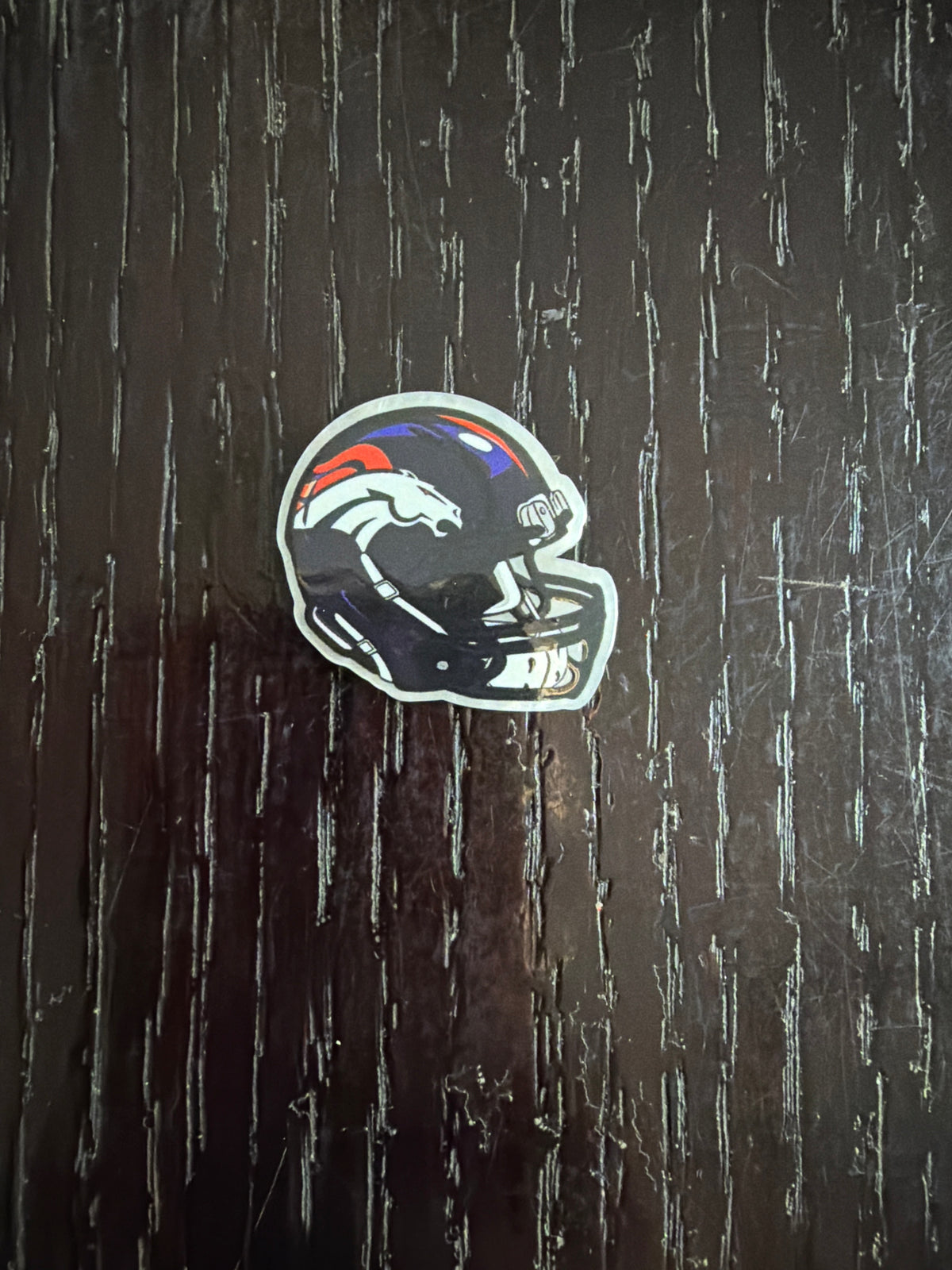 2. ADD A FOOTBALL HELMET CHARM
