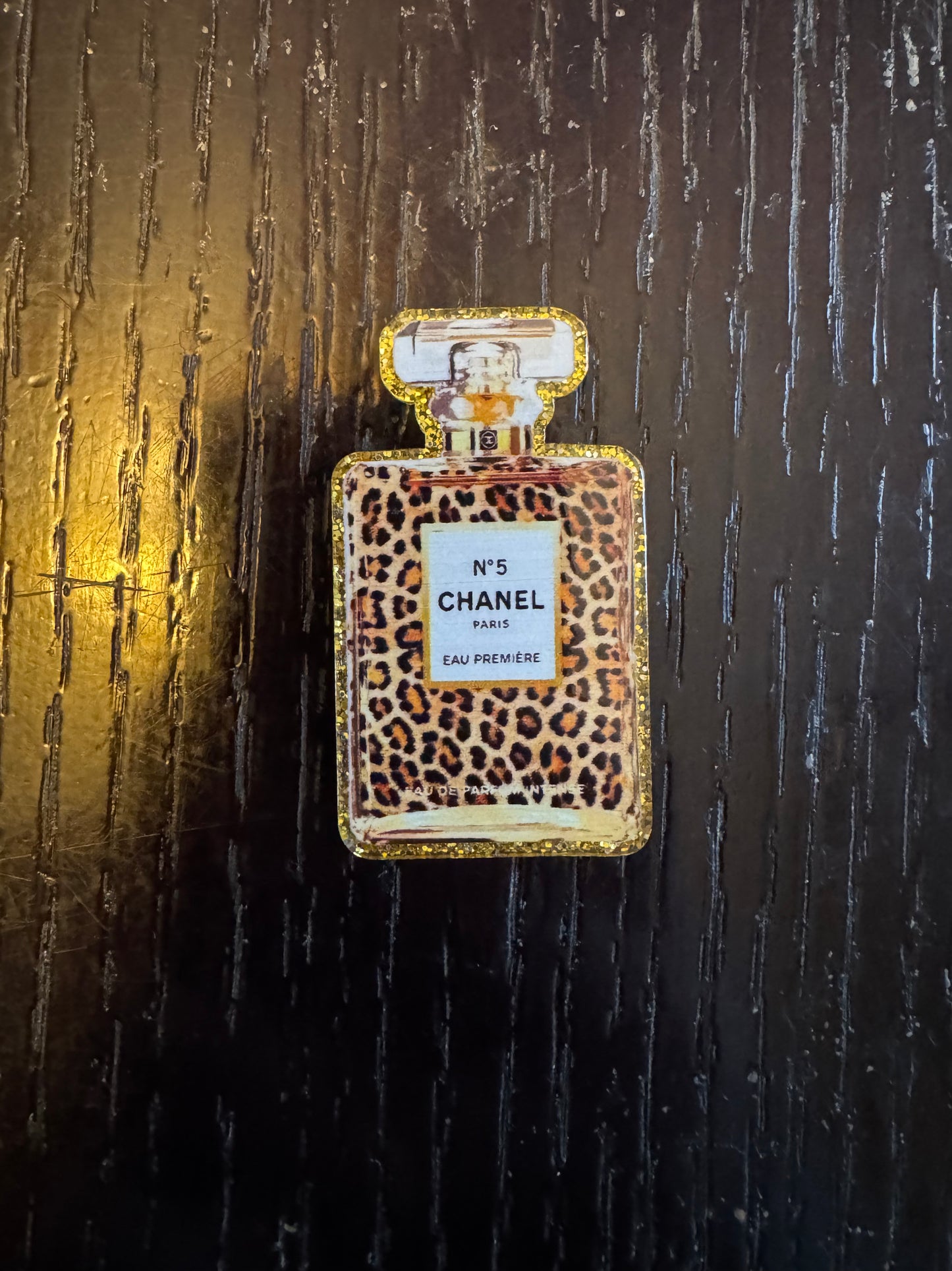 Chanel badge reel