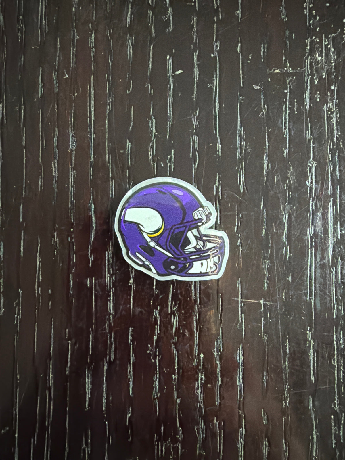 2. ADD A FOOTBALL HELMET CHARM