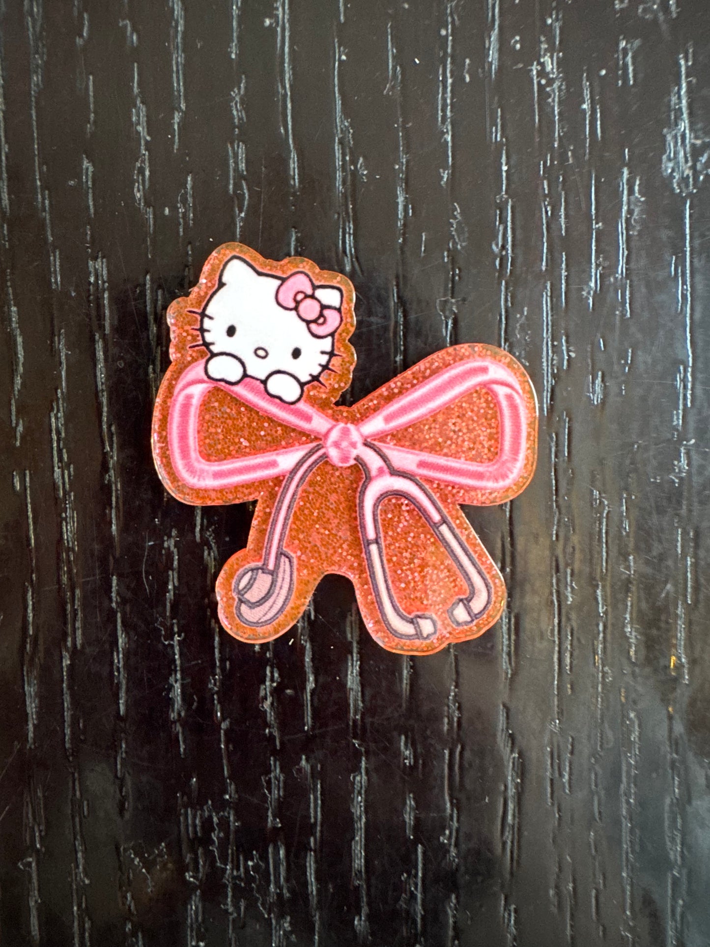 Hello kitty medical bow badge reel