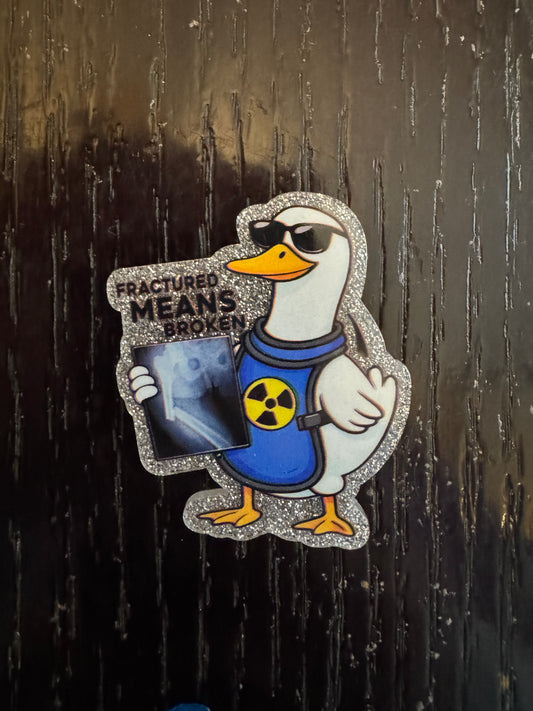 Fractured means broken badge reel