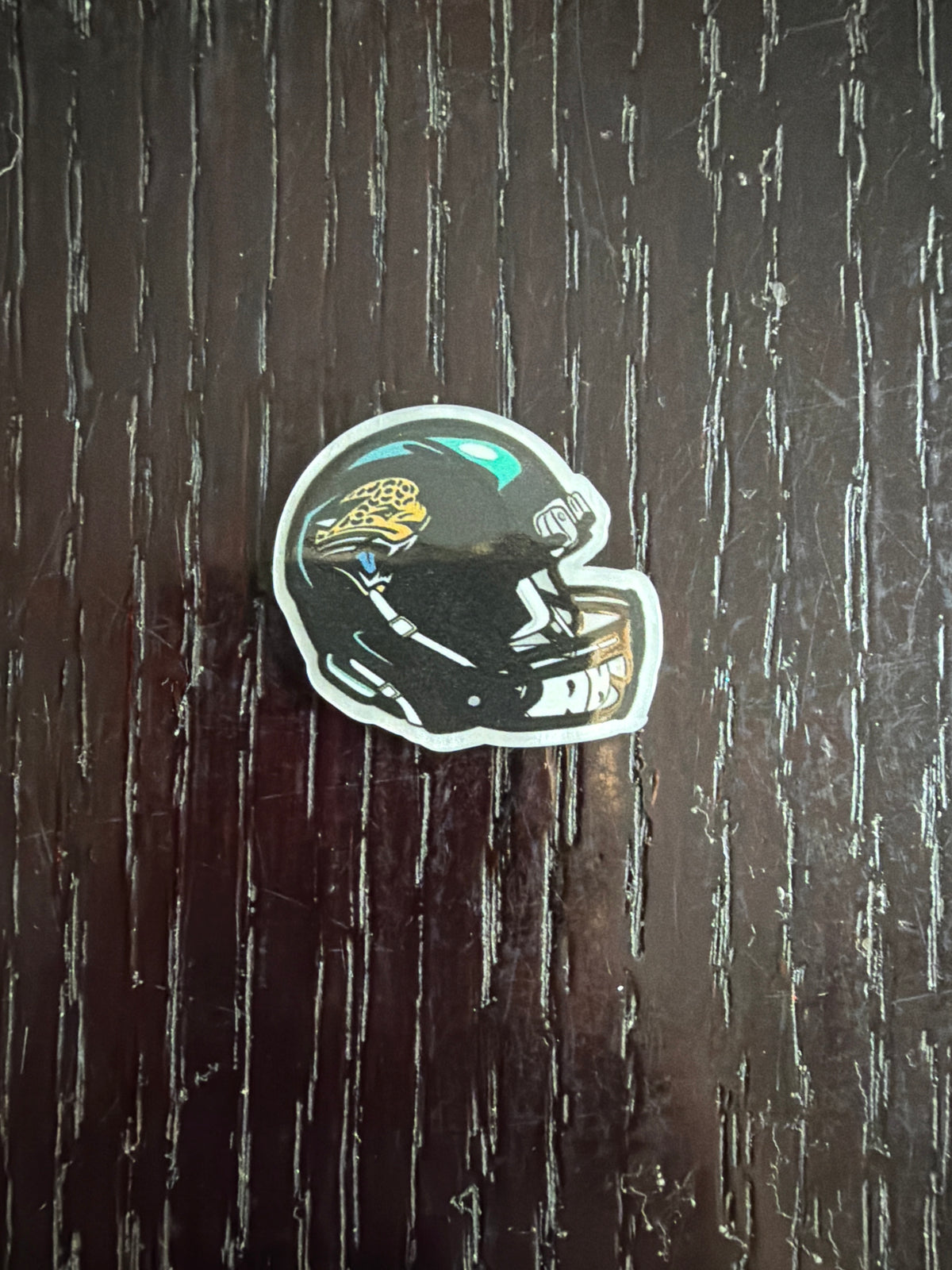 2. ADD A FOOTBALL HELMET CHARM