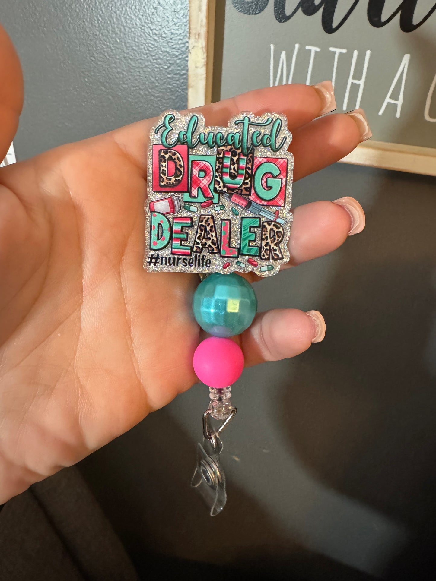 Educated drug dealer badge reel