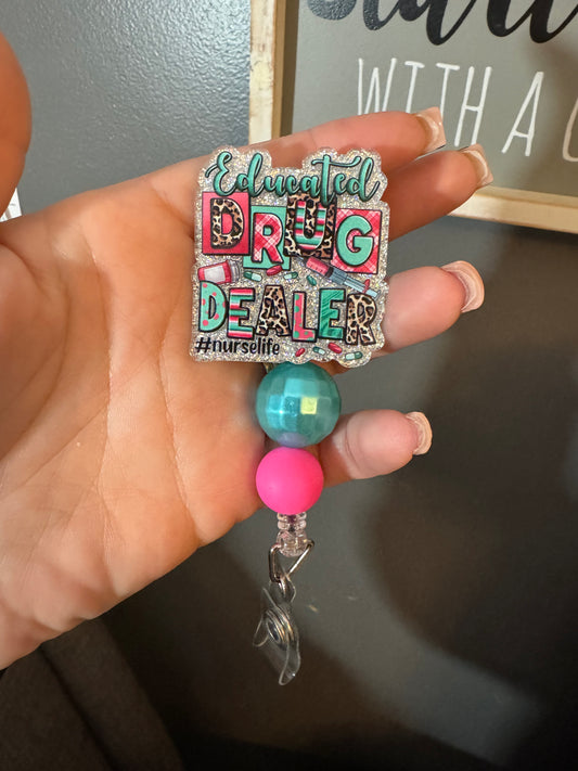 Educated drug dealer badge reel