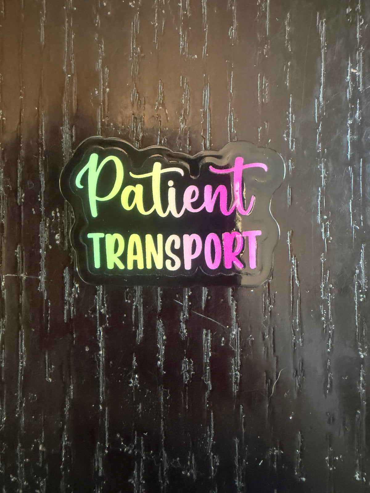 Patient transport badge reel